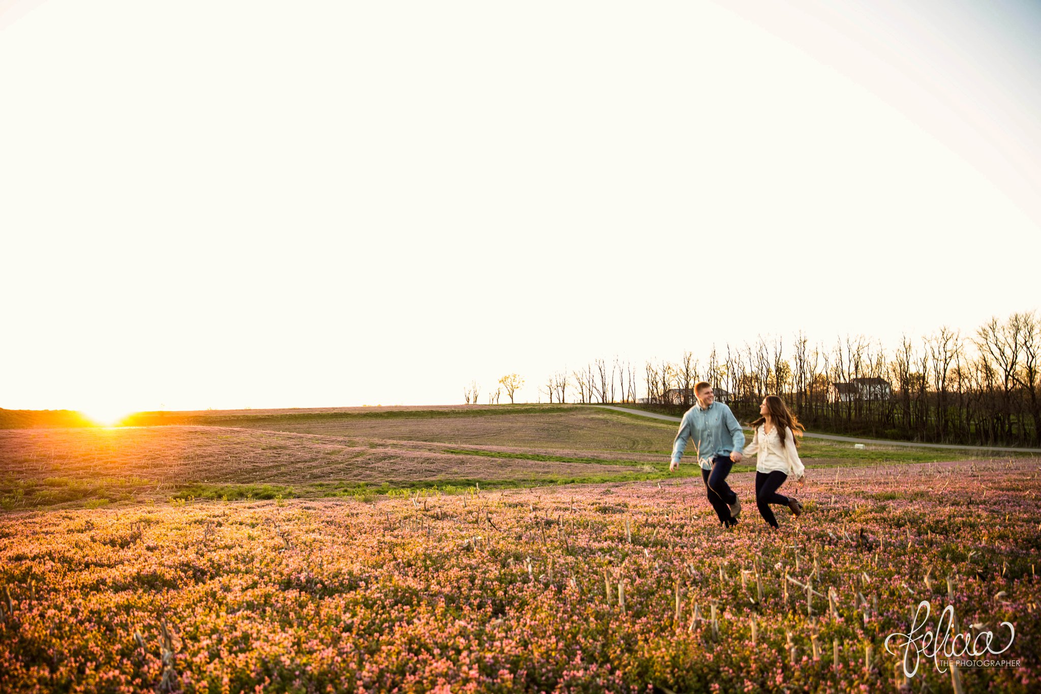 Romantic Engagement Photography | Kansas City, MO | Frolicking through Field at Sunset | Images by www.feliciathephotographer.com