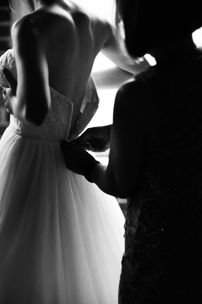 Boulevard Brewery Wedding Photos | Kansas City | Felicia The Photographer | Strapless Tulle Ballgown | Getting Ready Candid | Black and White