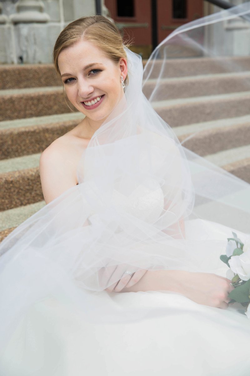 Guardian Angels Catholic Church Wedding Photos | Kansas City | Felicia The Photographer | Gothic Architecture | Bride sitting on steps