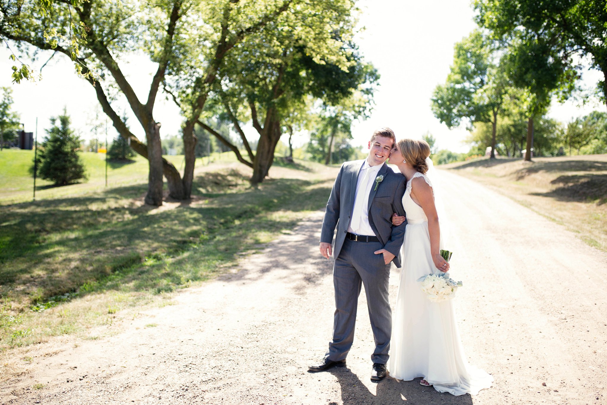 Sioux Falls Wedding Photos | Destination Photographer | Felicia The Photographer | Mary Jo Wegner Arboretum | Bride and Groom | Dirt Road