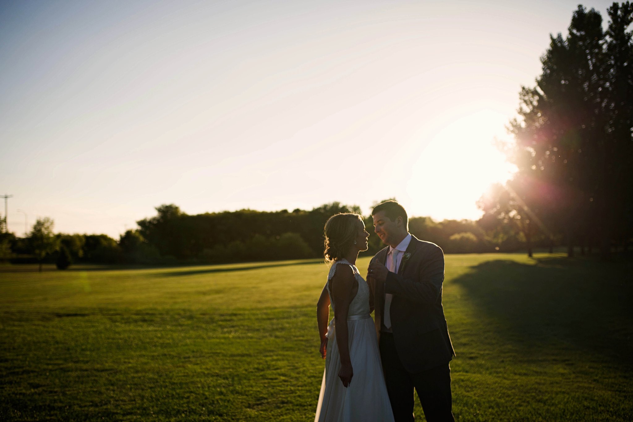 Sioux Falls Wedding Photos | Destination Photographer | Felicia The Photographer | Brandon Golf Club | Bride and Groom | Golden Hour | Walking | Dark and Moody
