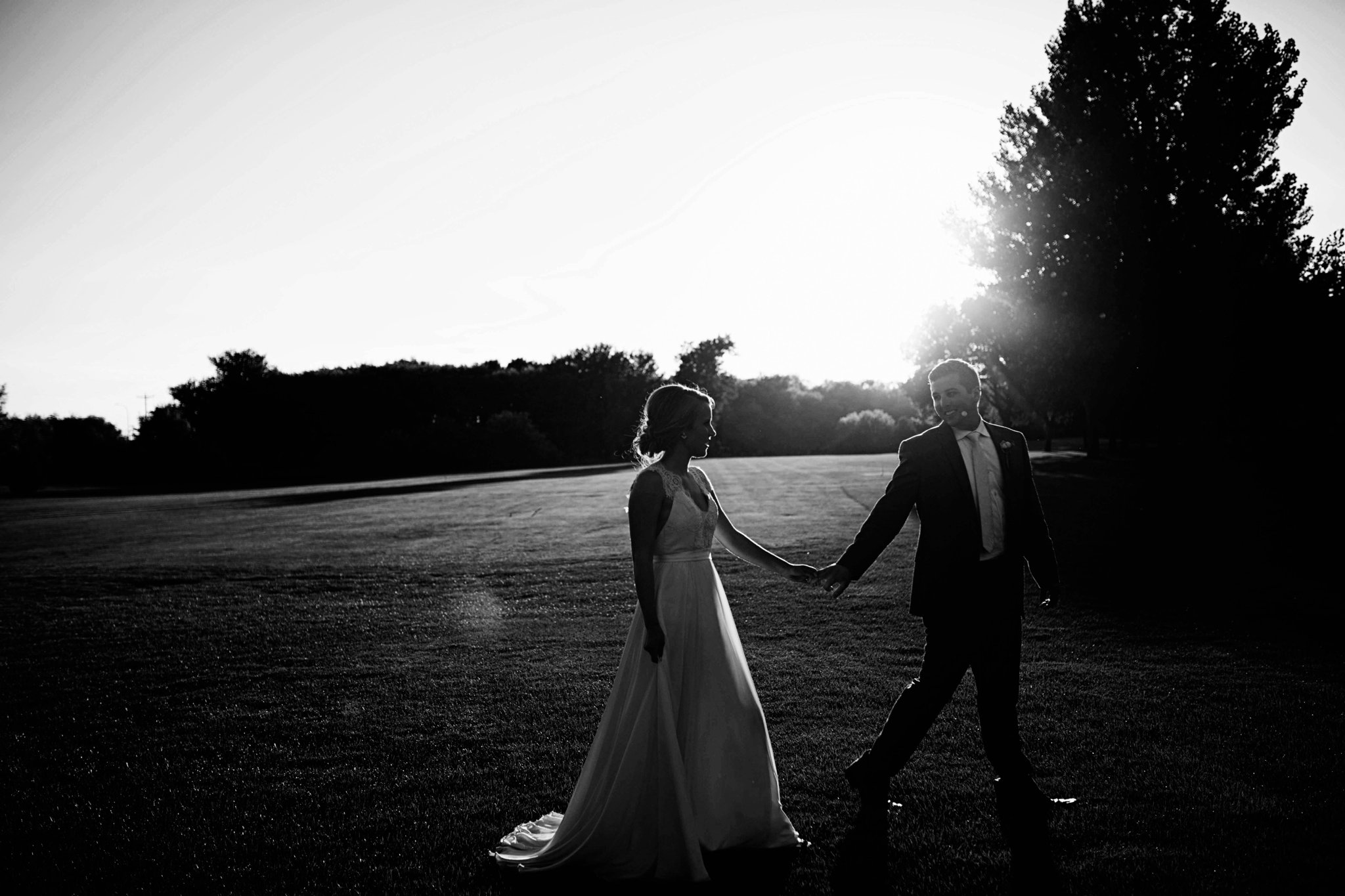 Sioux Falls Wedding Photos | Destination Photographer | Felicia The Photographer | Brandon Golf Club | Bride and Groom | Golden Hour | Walking | Dark and Moody | Black and White