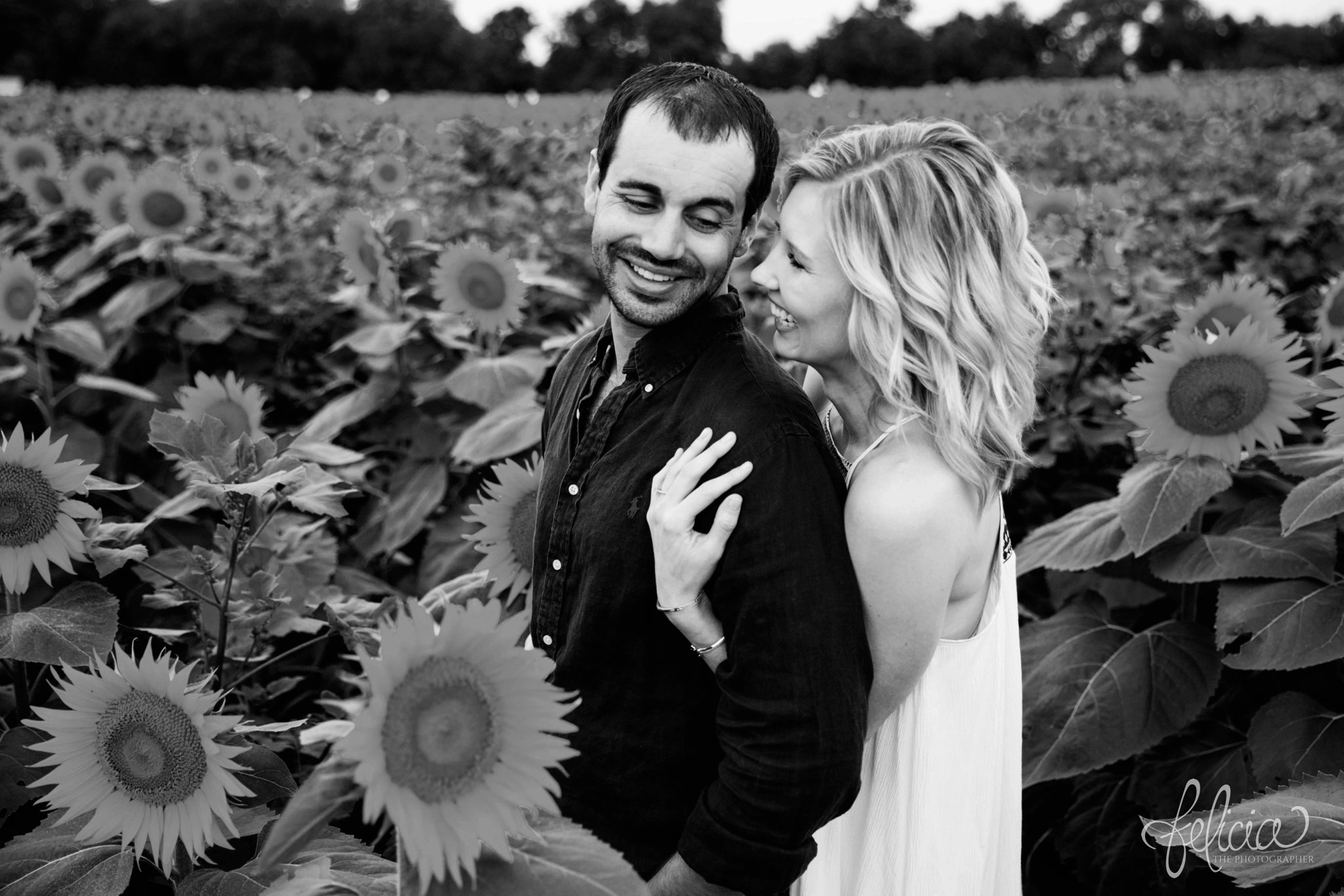 Sunrise Engagement Photos | Felicia The Photographer | Sunflower field | hug from behind | Black and White