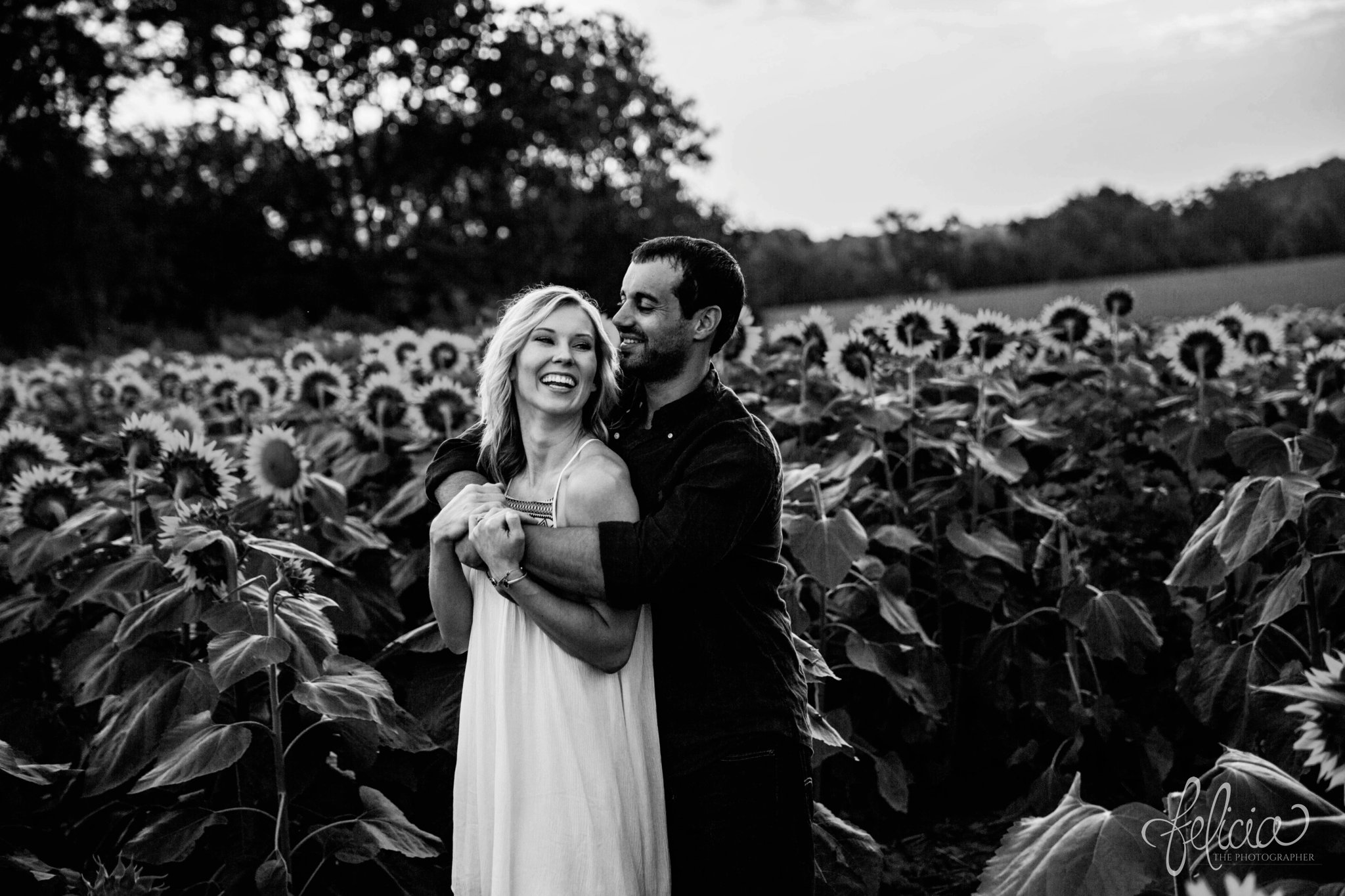 Sunrise Engagement Photos | Felicia The Photographer | Sunflower field | black and white | Laughing