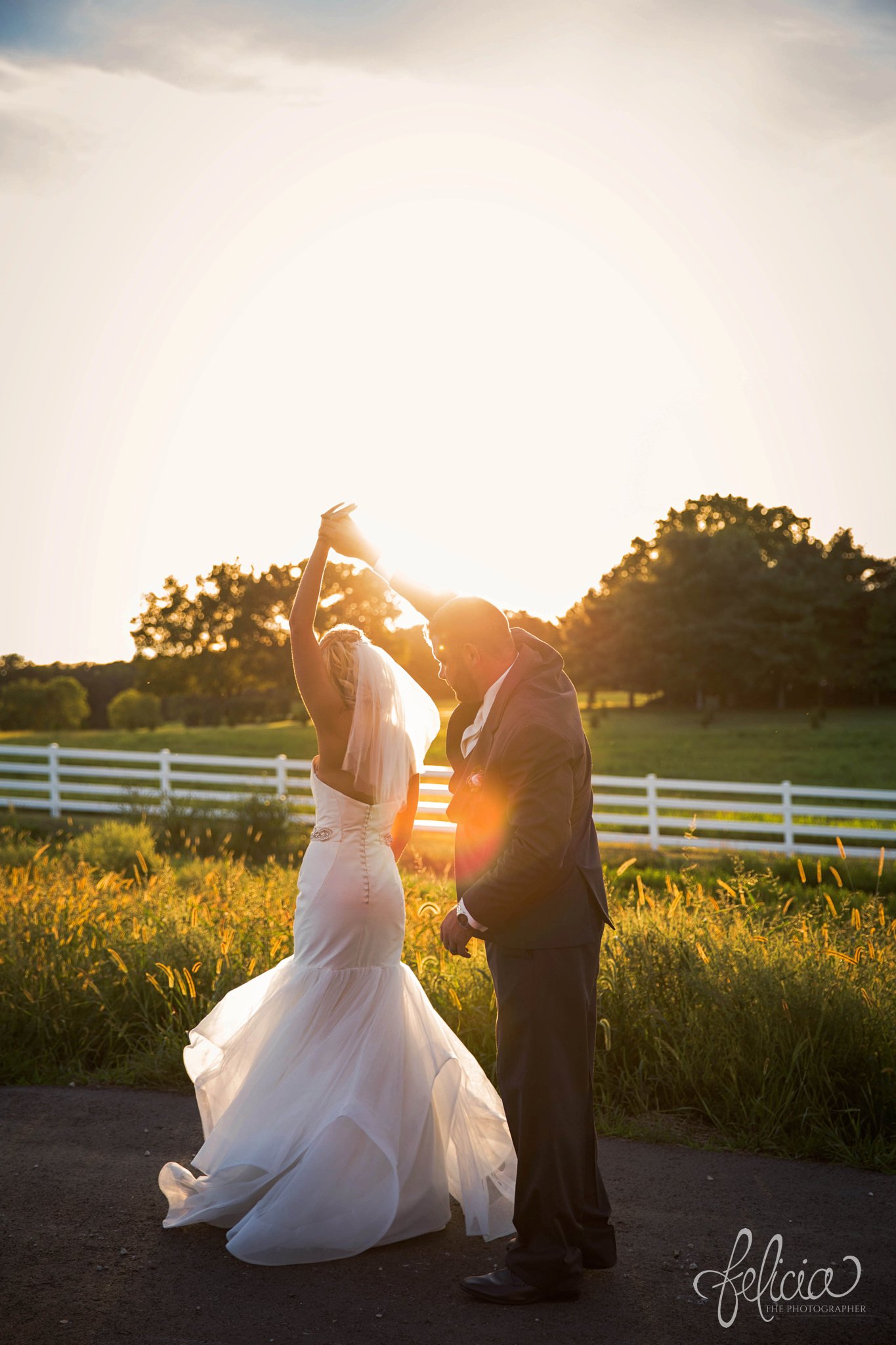 Bride and Groom Dancing | Photography | Golden Hour | Flare | Sunset | White Picket Fence | Eighteen Ninety | Kansas City Wedding Venue | Felicia The Photographer