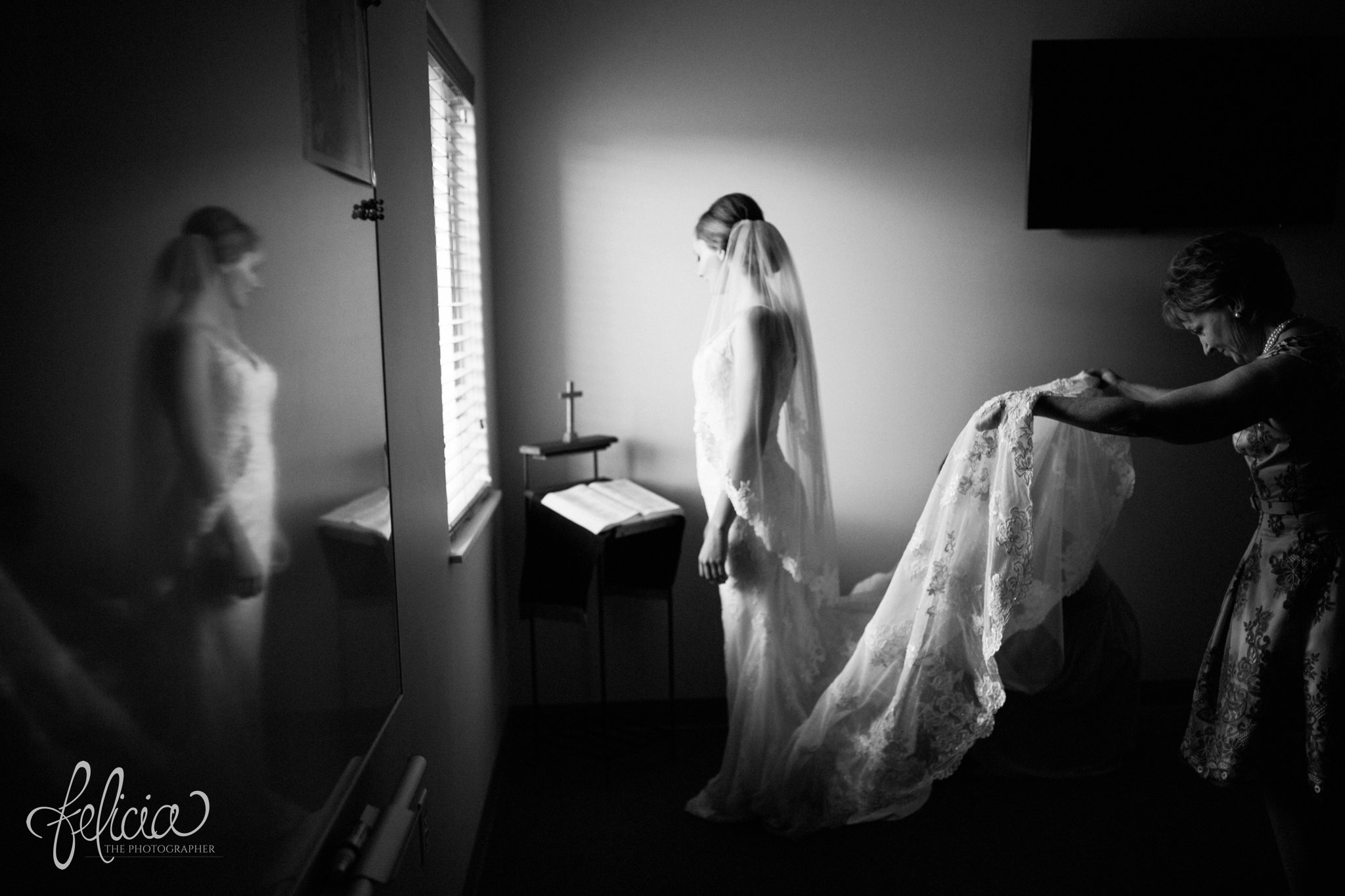 Black and White | Wedding | Wedding Photography | Wedding Photos | Travel Photographer | Images by feliciathephotographer.com | Getting Ready | Wedding Prep | Putting on Dress | Profile | Long Train 