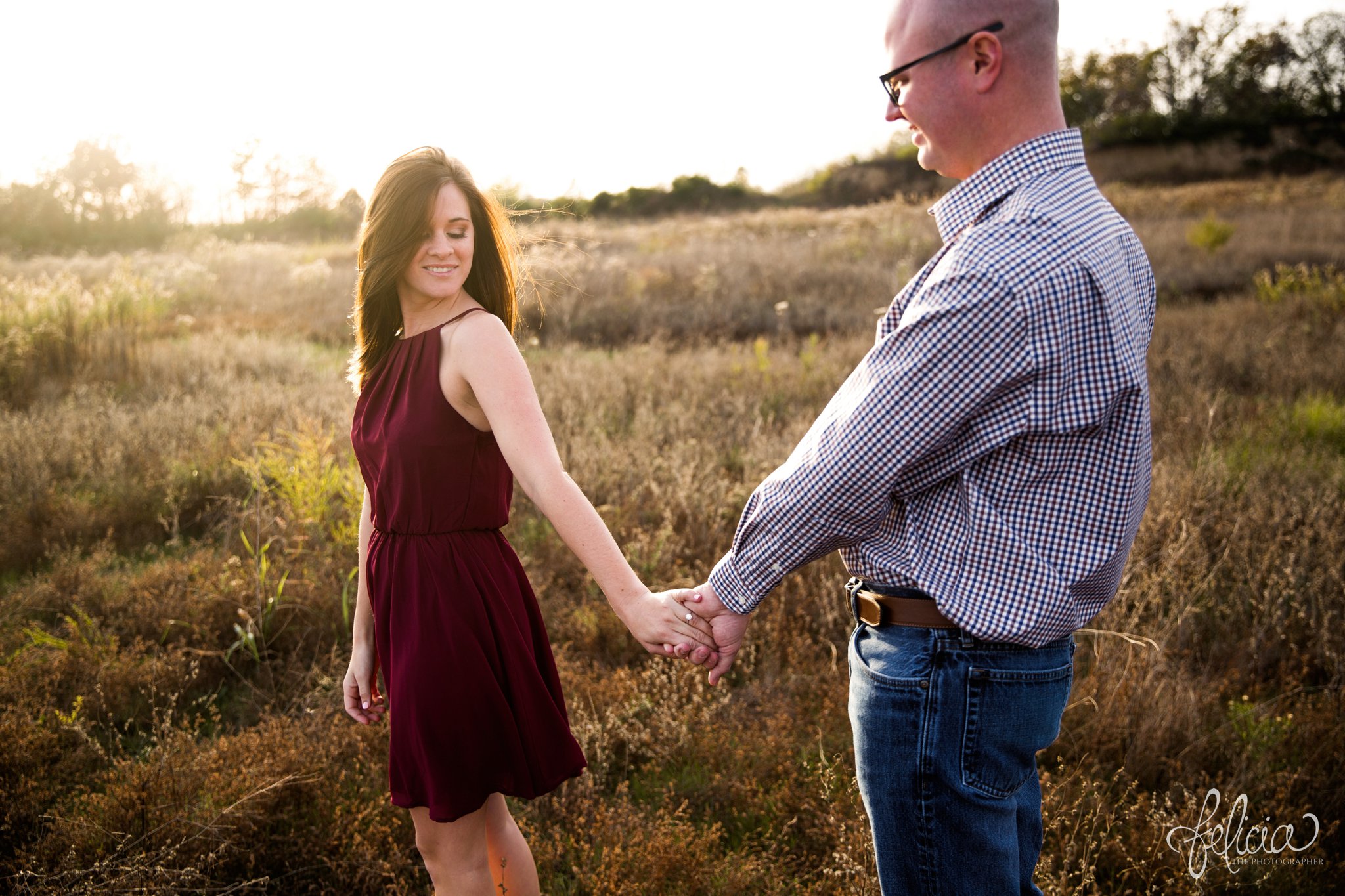 engagement pictures | engagement photos | nature | golden hour | sunset | sunset photography | fall | autumn | burgundy | cuddling | head kiss | closed eyes | sweet smiles | field | serene | peaceful 