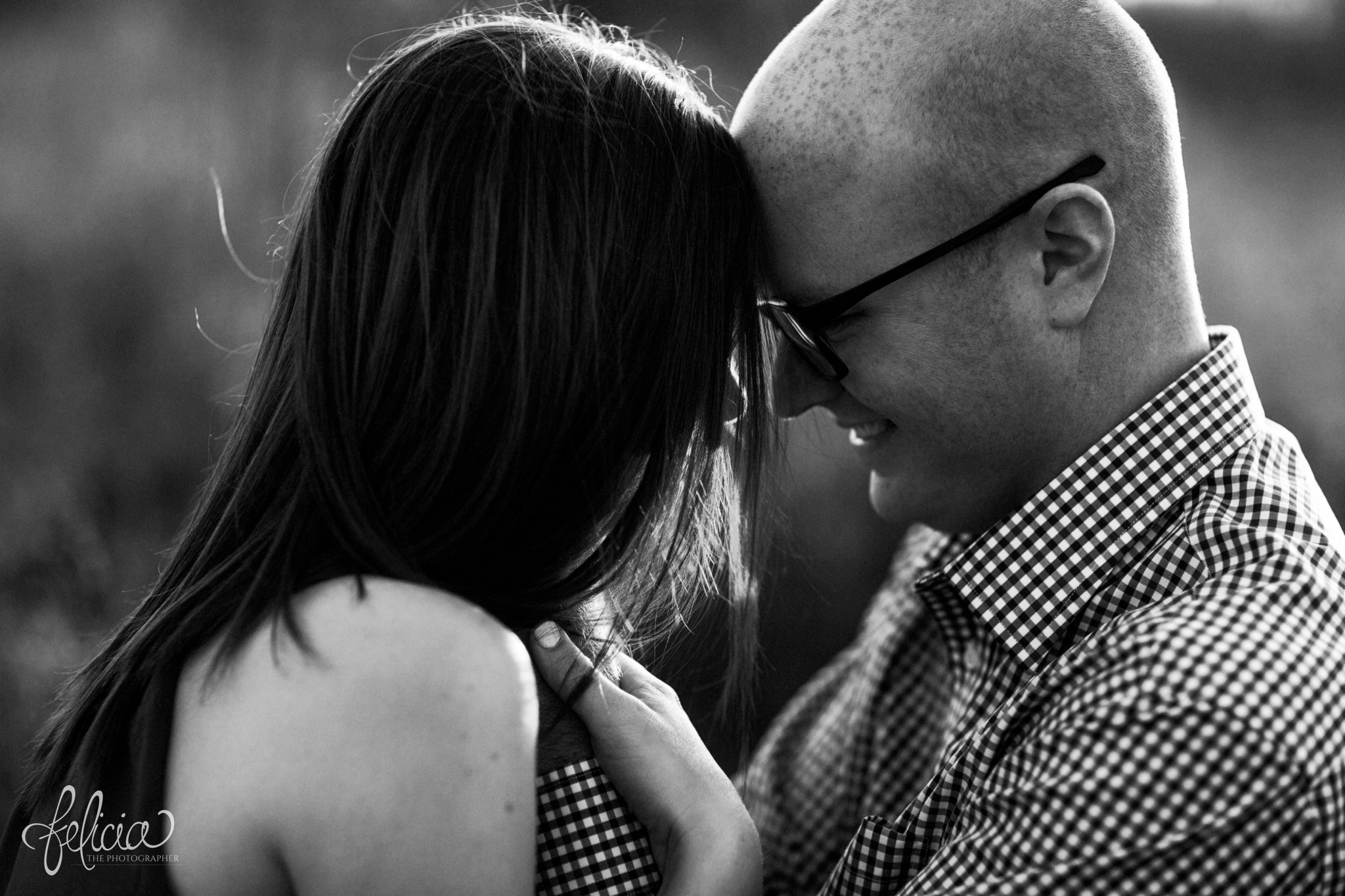 black and white | engagement pictures | engagement photos | nature | golden hour | sunset | sunset photography | fall | autumn | burgundy | laying in a field | lounging | close up | head shot | hand on cheek | romantic pose 