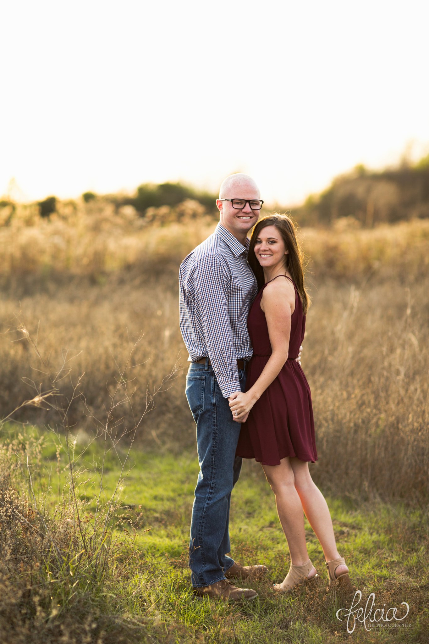 engagement pictures | engagement photos | nature | golden hour | sunset | sunset photography | fall | autumn | burgundy | natural | classic pose | sun flare 