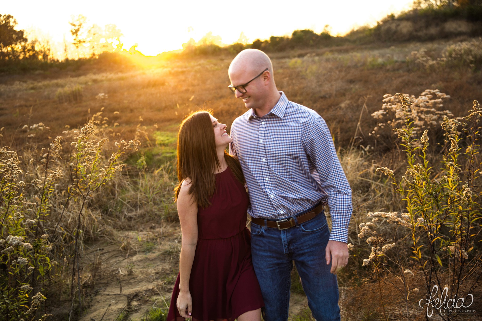 engagement pictures | engagement photos | nature | golden hour | sunset | sunset photography | fall | autumn | burgundy | natural | sun flare | nature background | candid | smiles 