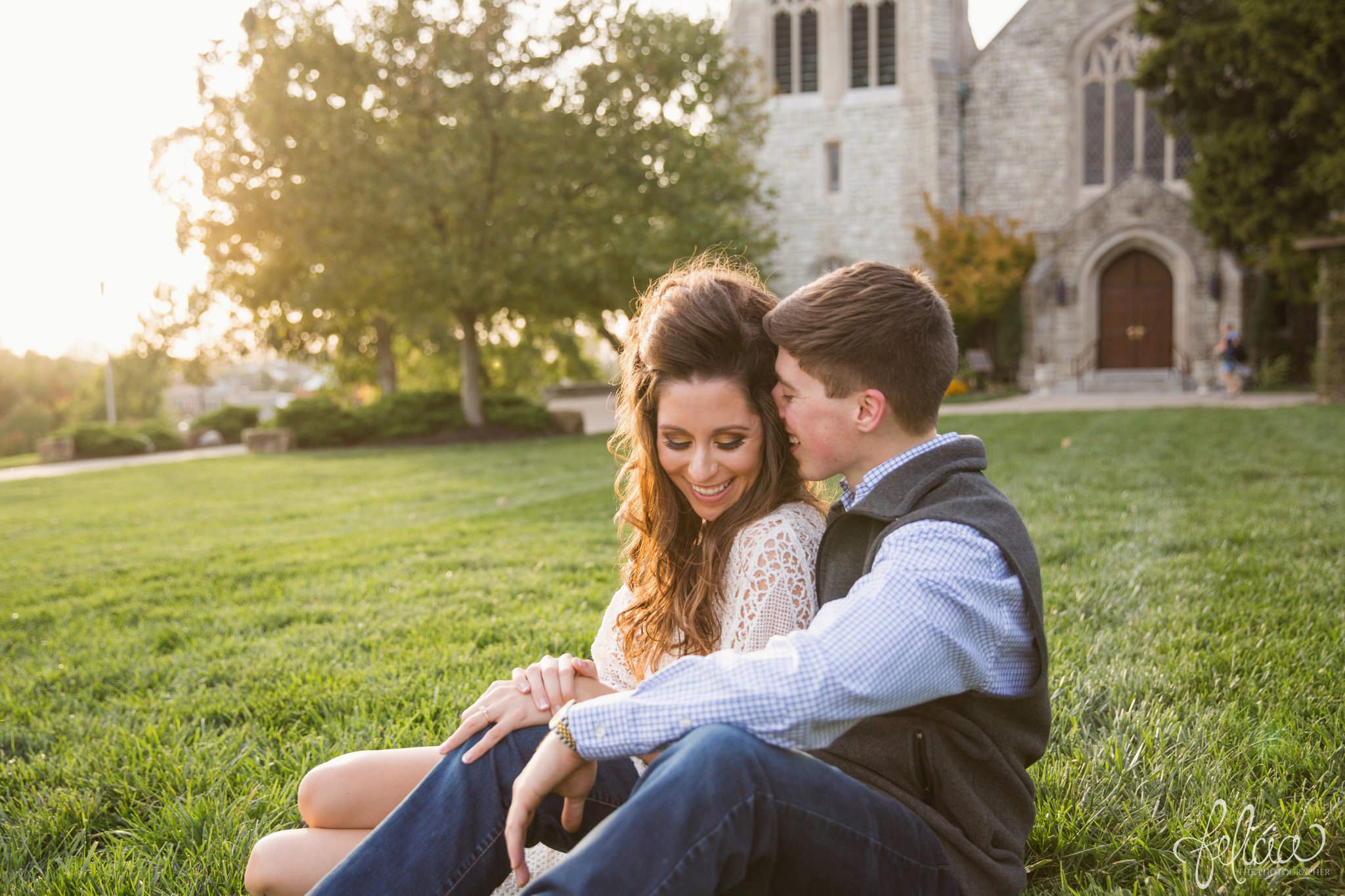 Engagement Photos | Engagement Photography | Sunset | Sunset Photography | Felicia the Photographer | Images by feliciathephotographer.com | Fall | Autumn | Lake | Sitting in Grass | Smiling | Sun Flare | Cuddling