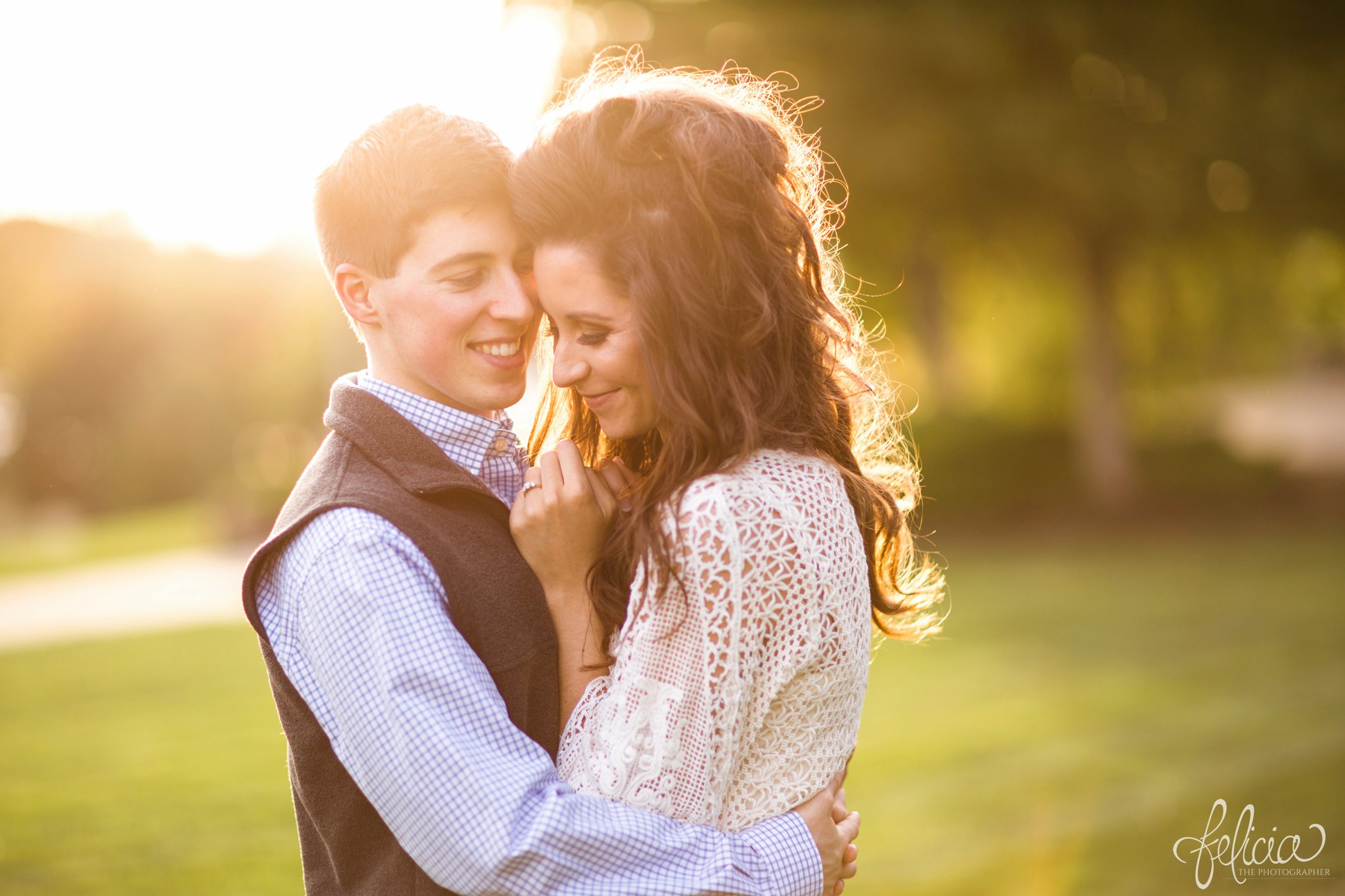 Engagement Photos | Engagement Photography | Sunset | Sunset Photography | Felicia the Photographer | Images by feliciathephotographer.com | Fall | Autumn | Lake | Sun Flare | Hugging | Hands on Chest 