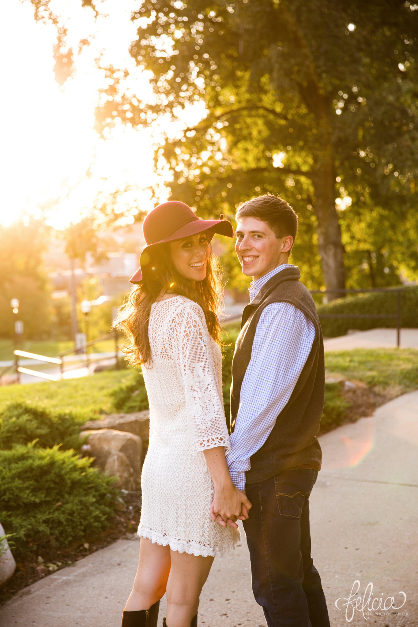 Engagement Photos | Engagement Photography | Sunset | Sunset Photography | Felicia the Photographer | Images by feliciathephotographer.com | Fall | Autumn | Lake | Sun Flare | Floppy Hat | Holding Hands 