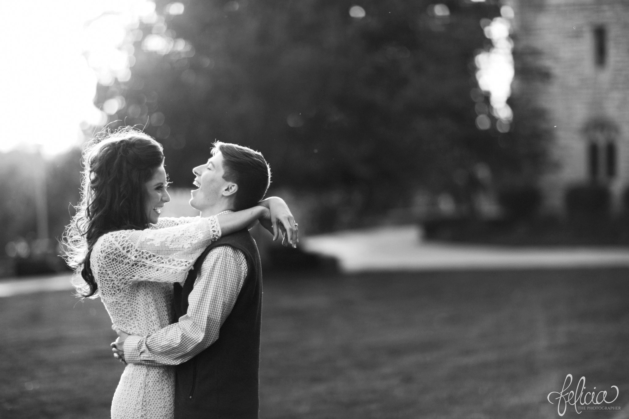 Black and White | Engagement Photos | Engagement Photography | Sunset | Sunset Photography | Felicia the Photographer | Images by feliciathephotographer.com | Fall | Autumn | Lake | Sun Flare | Hands Over Shoulders | Hands Around Waist | Candid | Laughter 