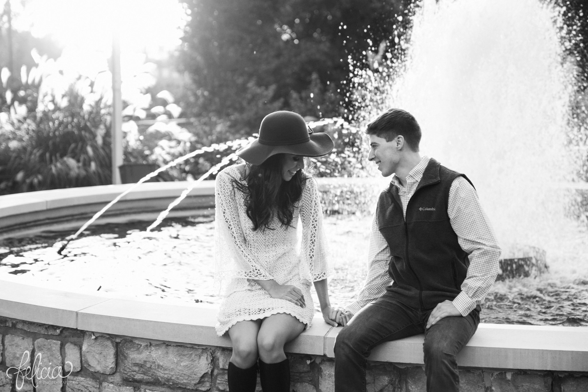 Black and White | Engagement Photos | Engagement Photography | Sunset | Sunset Photography | Felicia the Photographer | Images by feliciathephotographer.com | Fall | Autumn | Lake | Sun Flare | Floppy Hat | Regal | Candid | Fountain 