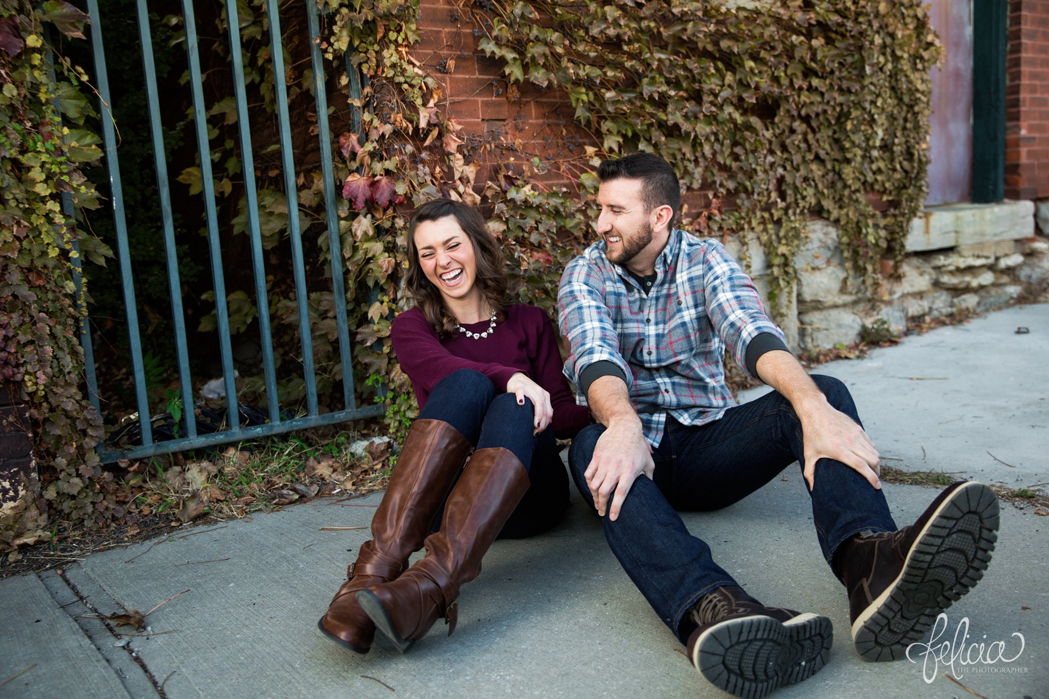 images by feliciathephotographer.com | engagement photos | engagement photography | Kansas City | West Bottoms | images by feliciathephotographer.com | urban setting | industrial background | candid | laughing 