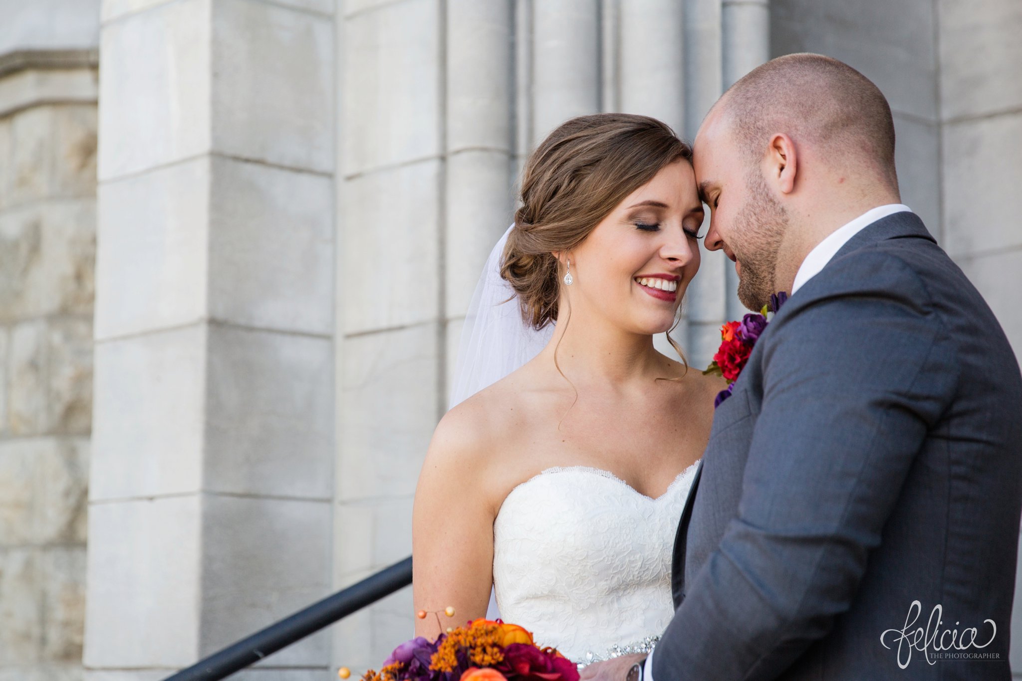 black and white | weddings | wedding photography | wedding photos | images by feliciathephotographer.com | St. Francis Xavier Church | Moila Country Club | autumn wedding | fall wedding | fall colors | harvest | purple and orange | Kansas City | St. Joseph | harvest inspiration | bride and groom portraits | church entrance | church steps | forehead touch | soft smile