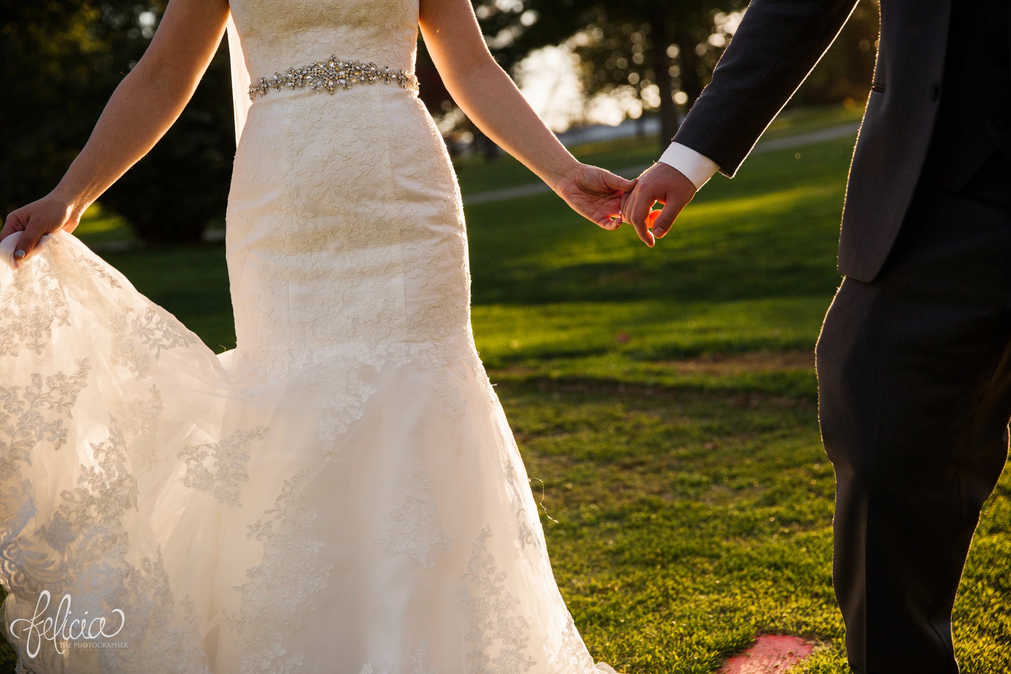 weddings | wedding photography | wedding photos | images by feliciathephotographer.com | St. Francis Xavier Church | Moila Country Club | autumn wedding | fall wedding | fall colors | harvest | purple and orange | Kansas City | St. Joseph | harvest inspiration | bride and groom portrait | outdoor | golden hour | sun flare | romantic pose | sweetheart neckline | lace details | hand hold | focused 