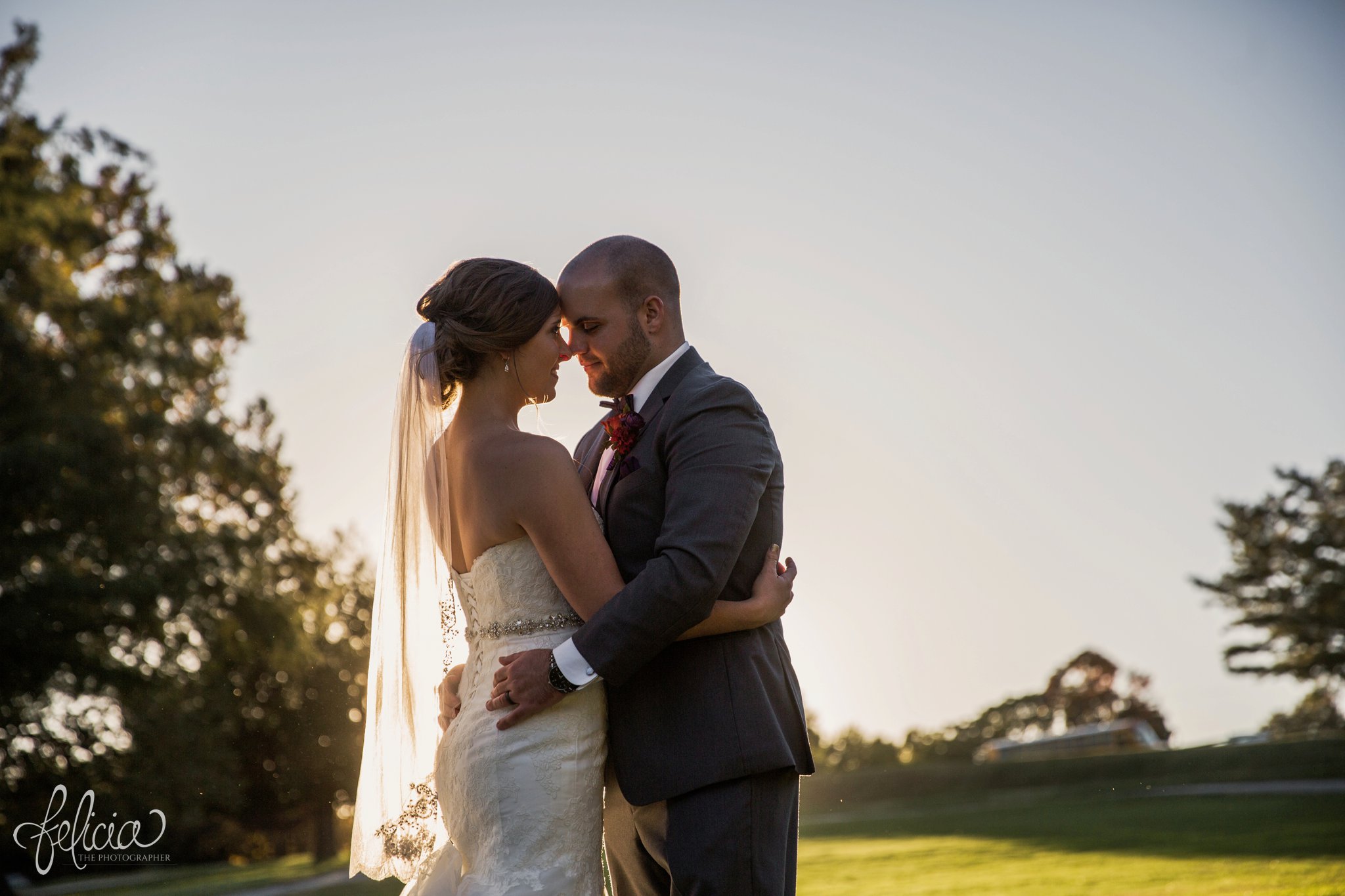 weddings | wedding photography | wedding photos | images by feliciathephotographer.com | St. Francis Xavier Church | Moila Country Club | autumn wedding | fall wedding | fall colors | harvest | purple and orange | Kansas City | St. Joseph | harvest inspiration | bride and groom portrait | outdoor | golden hour | sun flare | romantic pose | forehead touch 