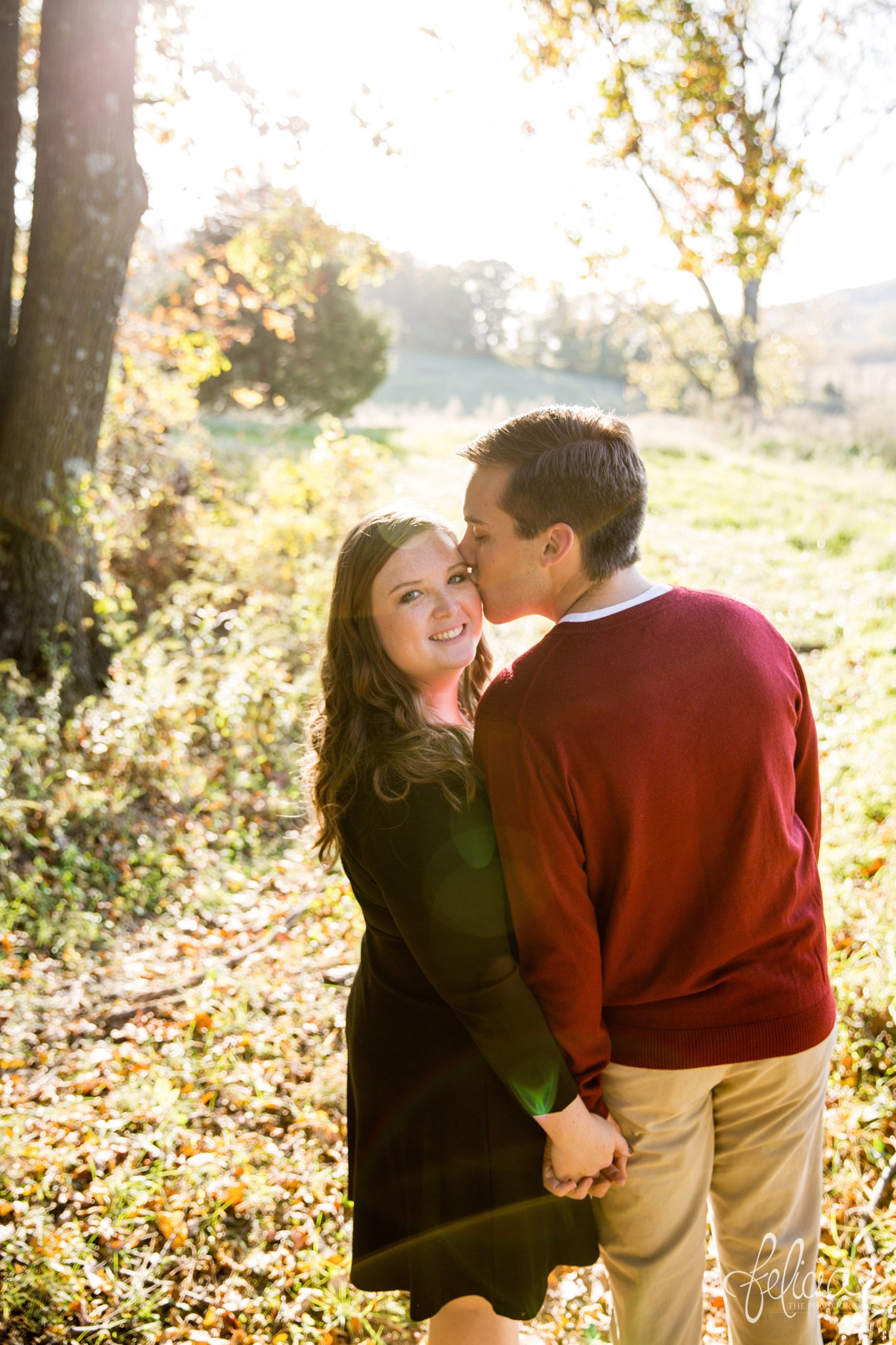 engagement photos | engagement photography | Felicia the Photographer | images by feliciathephotographer.com | sun flare | farm | nature | cowboy boots | kiss on cheek 