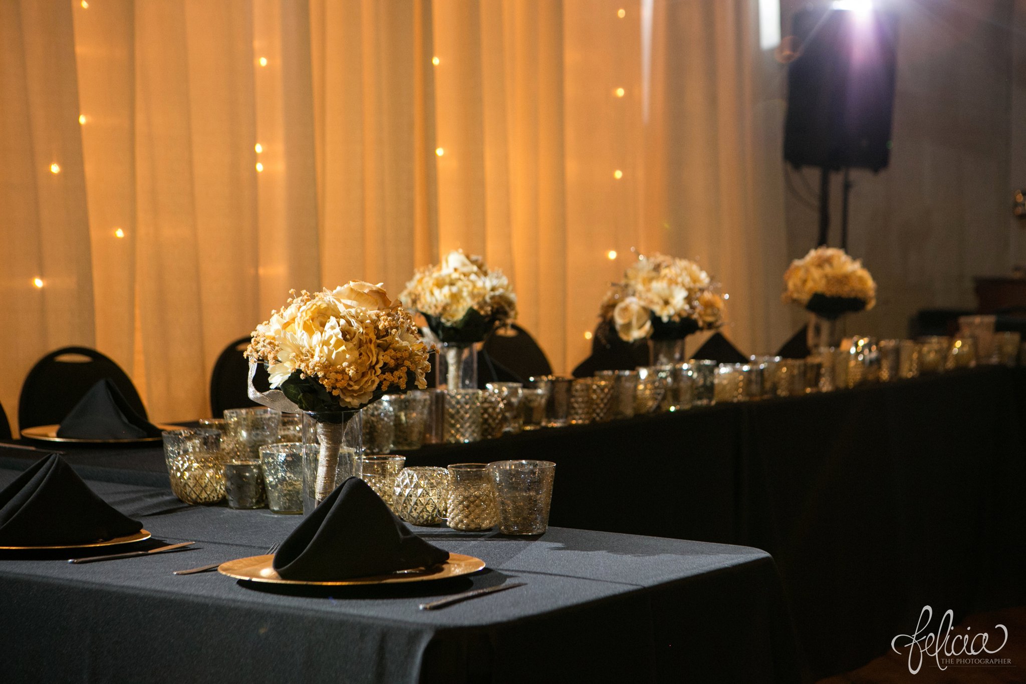 weddings | wedding photos | wedding photography | images by feliciathephotographer.com | St. Therese Catholic Church | Kansas City | downtown | The Terrace on Grand | reception venue | black and gold | silver tableware | centerpieces | white lights 