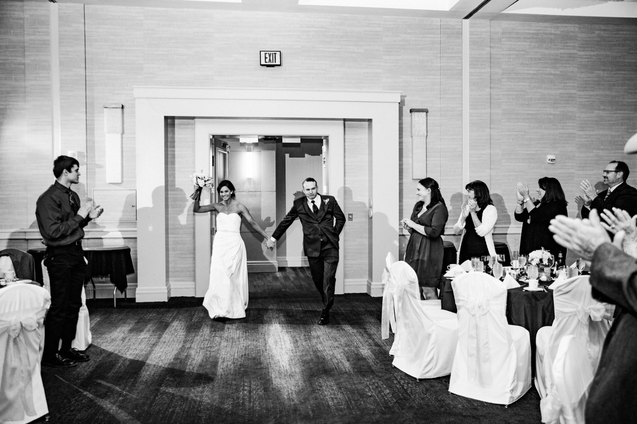 black and white | wedding | wedding photos | wedding photography | images by feliciathephotographer.com | Country Club Plaza | Kansas City | The Marriott | Unity Temple | reception venue | bride and groom entrance | Mr. and Mrs. 