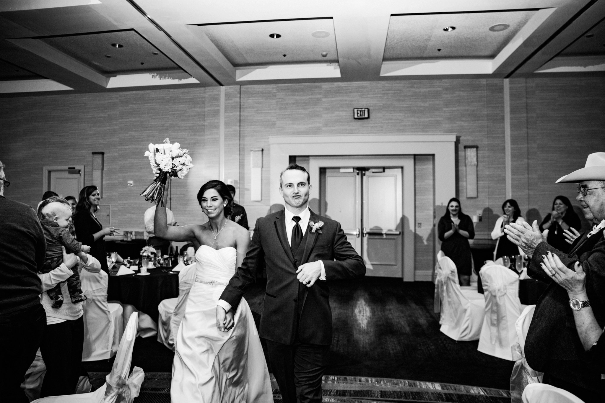 black and white | wedding | wedding photos | wedding photography | images by feliciathephotographer.com | Country Club Plaza | Kansas City | The Marriott | Unity Temple | reception venue | bride and groom entrance | Mr. and Mrs. 