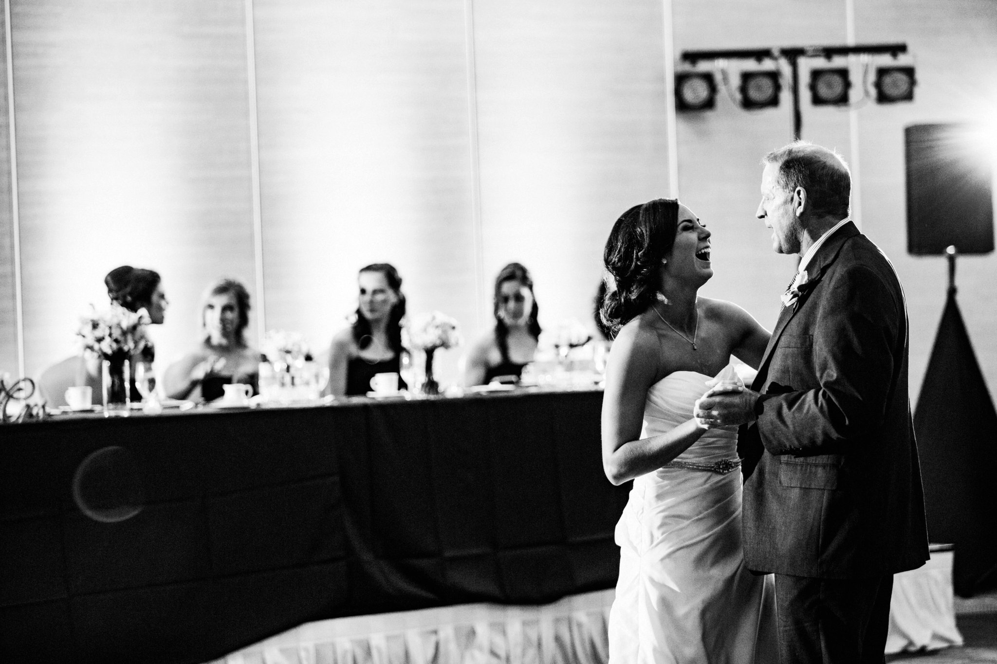 black and white | wedding | wedding photos | wedding photography | images by feliciathephotographer.com | Country Club Plaza | Kansas City | The Marriott | Unity Temple | reception venue | first dance | candid | laughing bride 