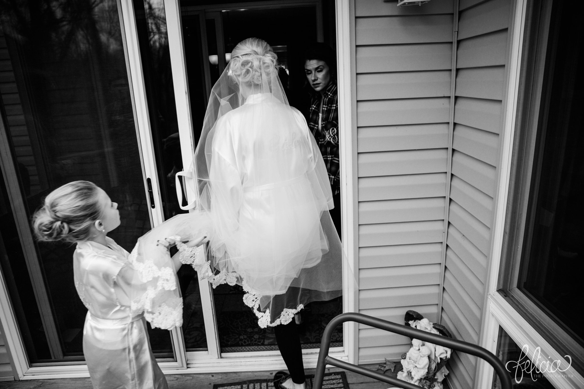 black and white | wedding | wedding photography | wedding photos | Kansas City | St. Patrick's Catholic Church | Hawthorne House | images by feliciathephotographer.com | crimson wedding | Christmas Wedding | bride with flower girl | nature background | getting ready | wedding prep 