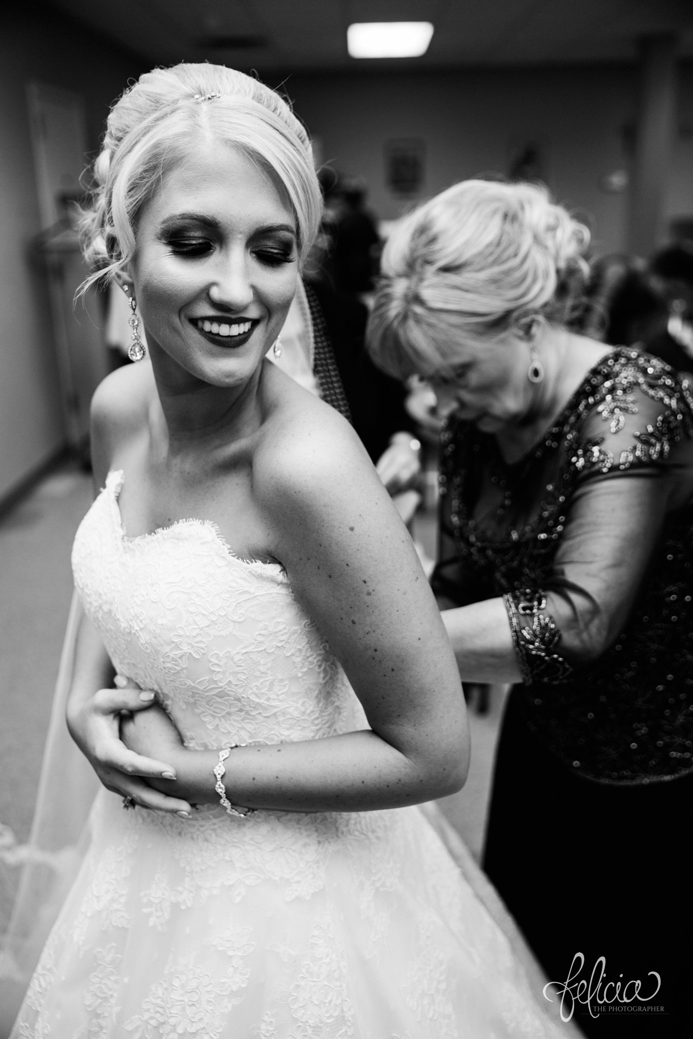 black and white | wedding | wedding photography | wedding photos | Kansas City | St. Patrick's Catholic Church | Hawthorne House | images by feliciathephotographer.com | crimson wedding | Christmas Wedding | nature background | getting ready | wedding prep | mother and bride | candid | Paula Varsalona | sweetheart neckline 