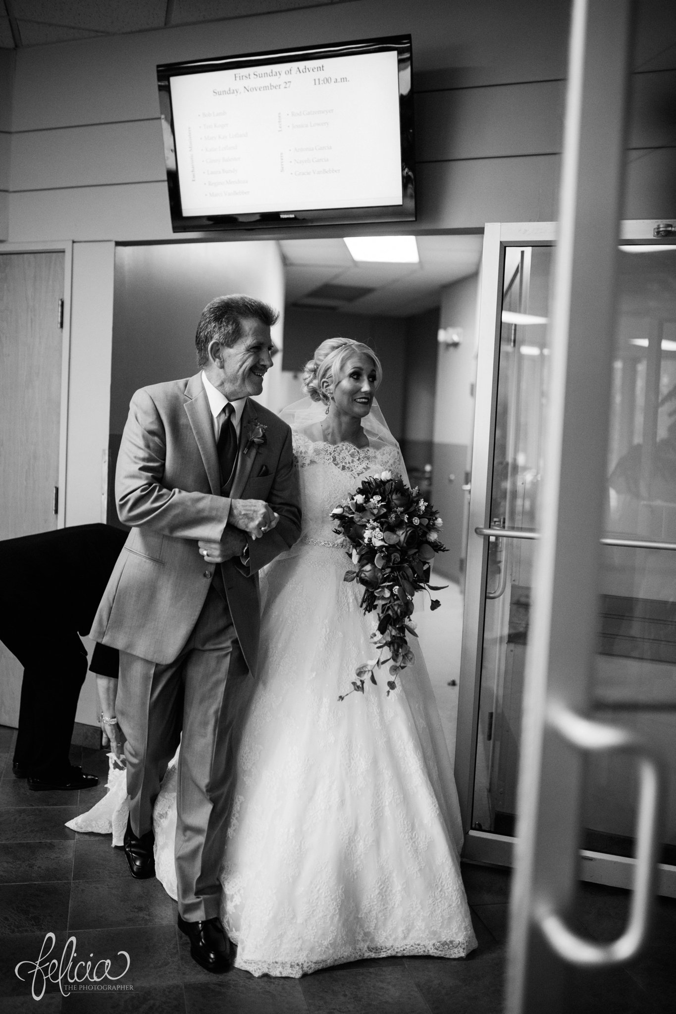 black and white | wedding | wedding photography | wedding photos | Kansas City | St. Patrick's Catholic Church | Hawthorne House | images by feliciathephotographer.com | crimson wedding | Christmas Wedding | candid | ceremony | father with bride | walking down the aisle 