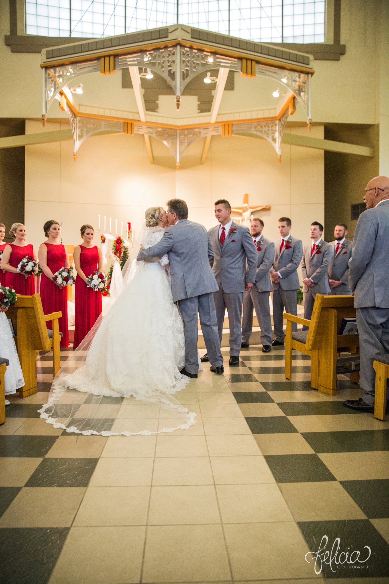 wedding | wedding photography | wedding photos | Kansas City | St. Patrick's Catholic Church | Hawthorne House | images by feliciathephotographer.com | crimson wedding | Christmas Wedding | candid | ceremony | father with bride | walking down the aisle | giving bride away 