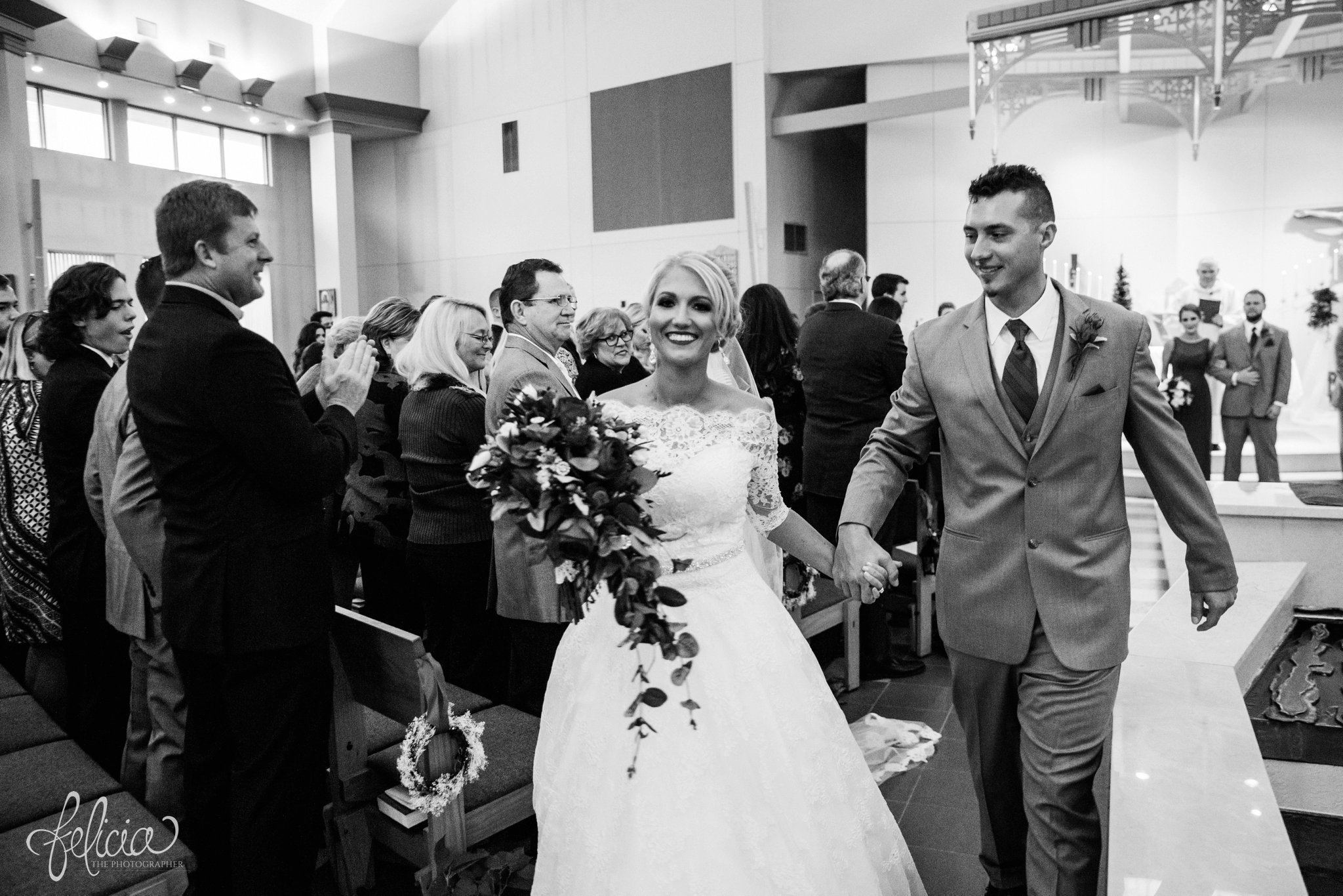 black and white | wedding | wedding photography | wedding photos | Kansas City | St. Patrick's Catholic Church | Hawthorne House | images by feliciathephotographer.com | crimson wedding | Christmas Wedding | ceremony | bride and groom down the aisle | husband and wife | candid 