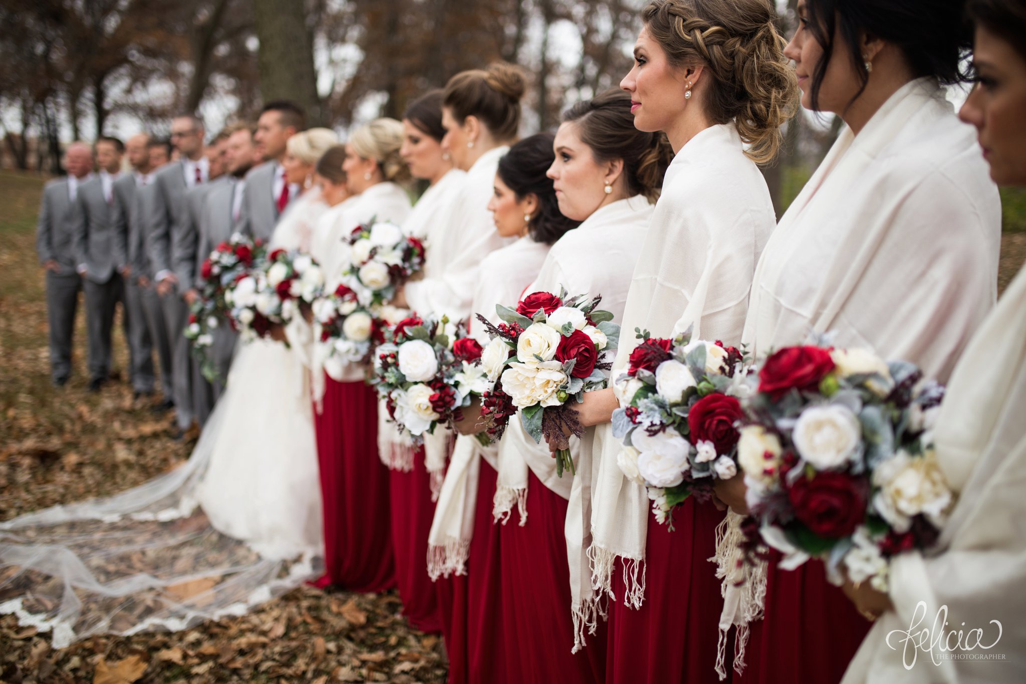 wedding | wedding photography | wedding photos | Kansas City | St. Patrick's Catholic Church | Hawthorne House | images by feliciathephotographer.com | crimson wedding | Christmas Wedding | winter portraits | nature background | bridal party portrait | crimson bridesmaid dresses | dramatic veil 