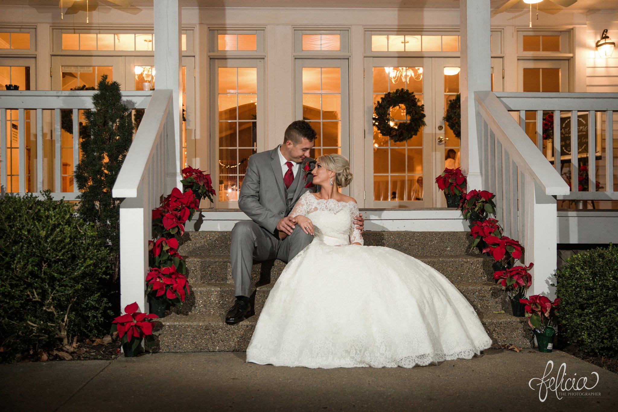 wedding | wedding photography | wedding photos | Kansas City | Hawthorne House | images by feliciathephotographer.com | crimson wedding | Christmas Wedding | red roses | french doors | evergreen | poinsettia | bride and groom portrait | staircase pose | patio pictures | lace wedding dress 