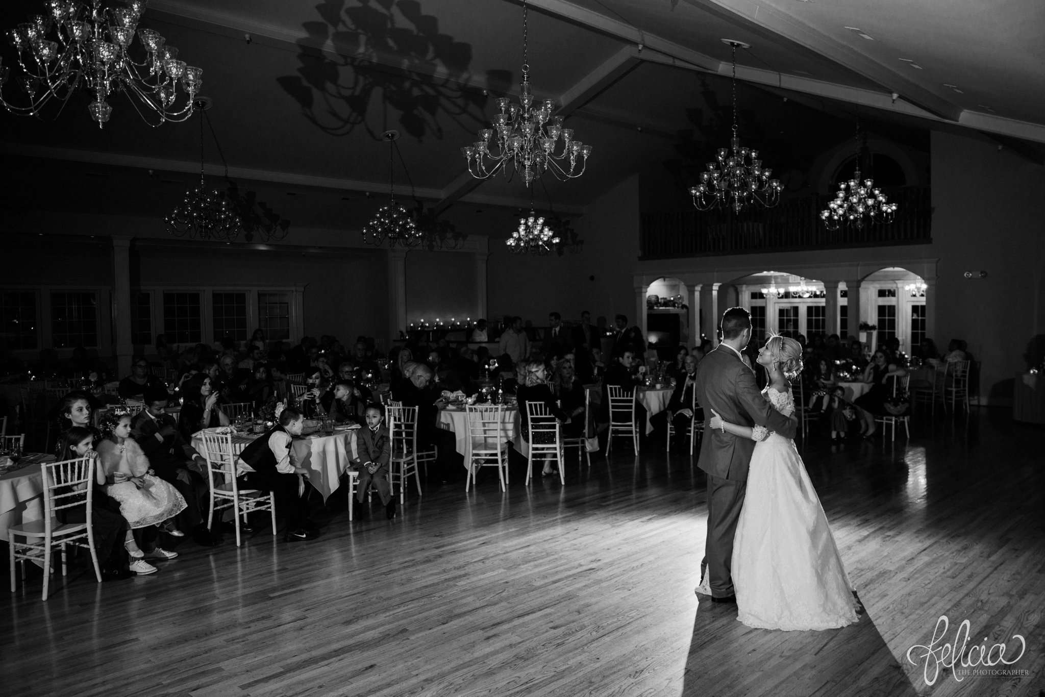 black and white | wedding | wedding photography | wedding photos | Kansas City | Hawthorne House | images by feliciathephotographer.com | crimson wedding | Christmas Wedding | first dance | chandeliers | wedding reception