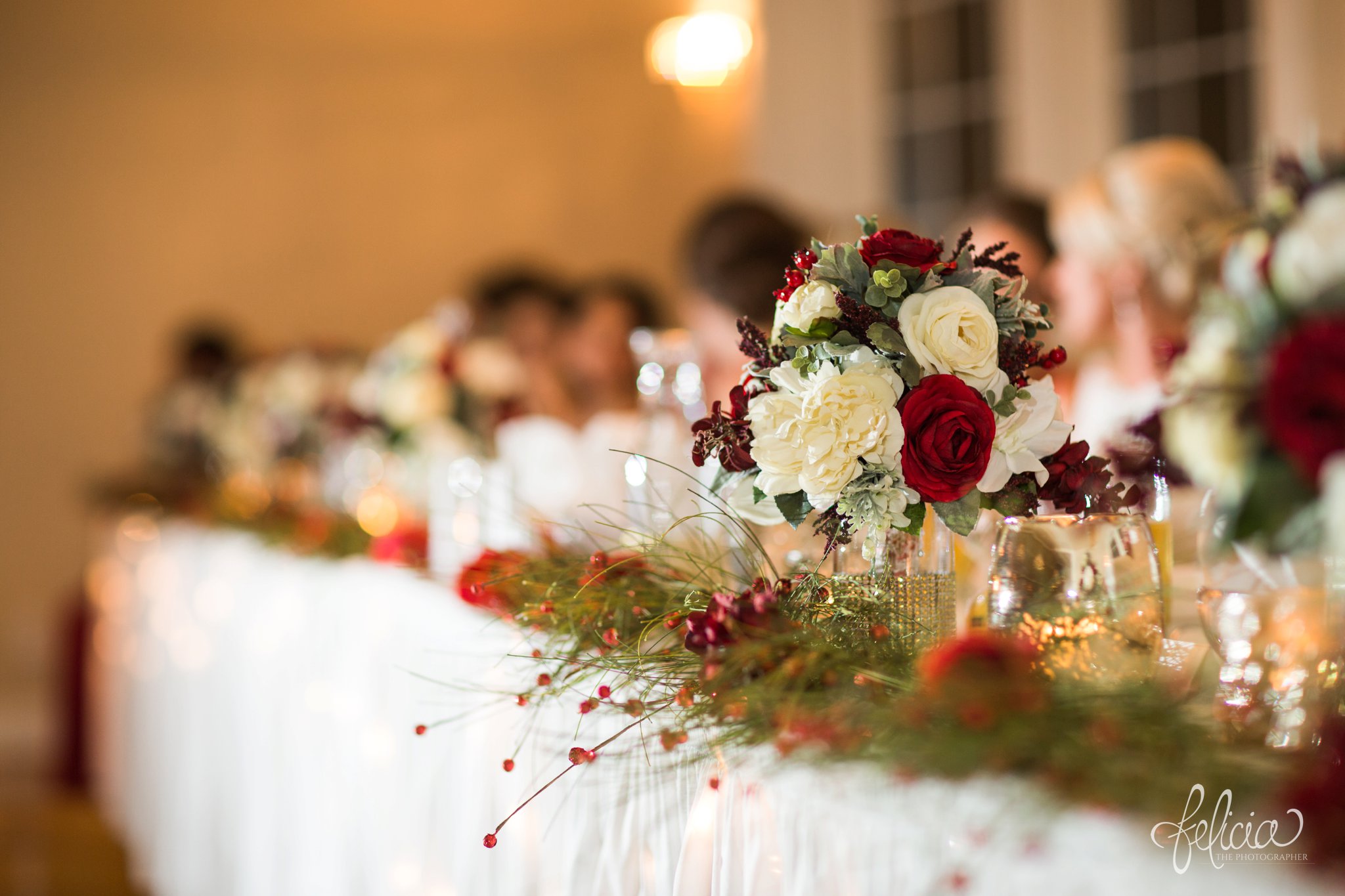 wedding | wedding photography | wedding photos | Kansas City | Hawthorne House | images by feliciathephotographer.com | crimson wedding | Christmas Wedding | bridal party table | centerpieces | red and white bouquet | wedding reception |