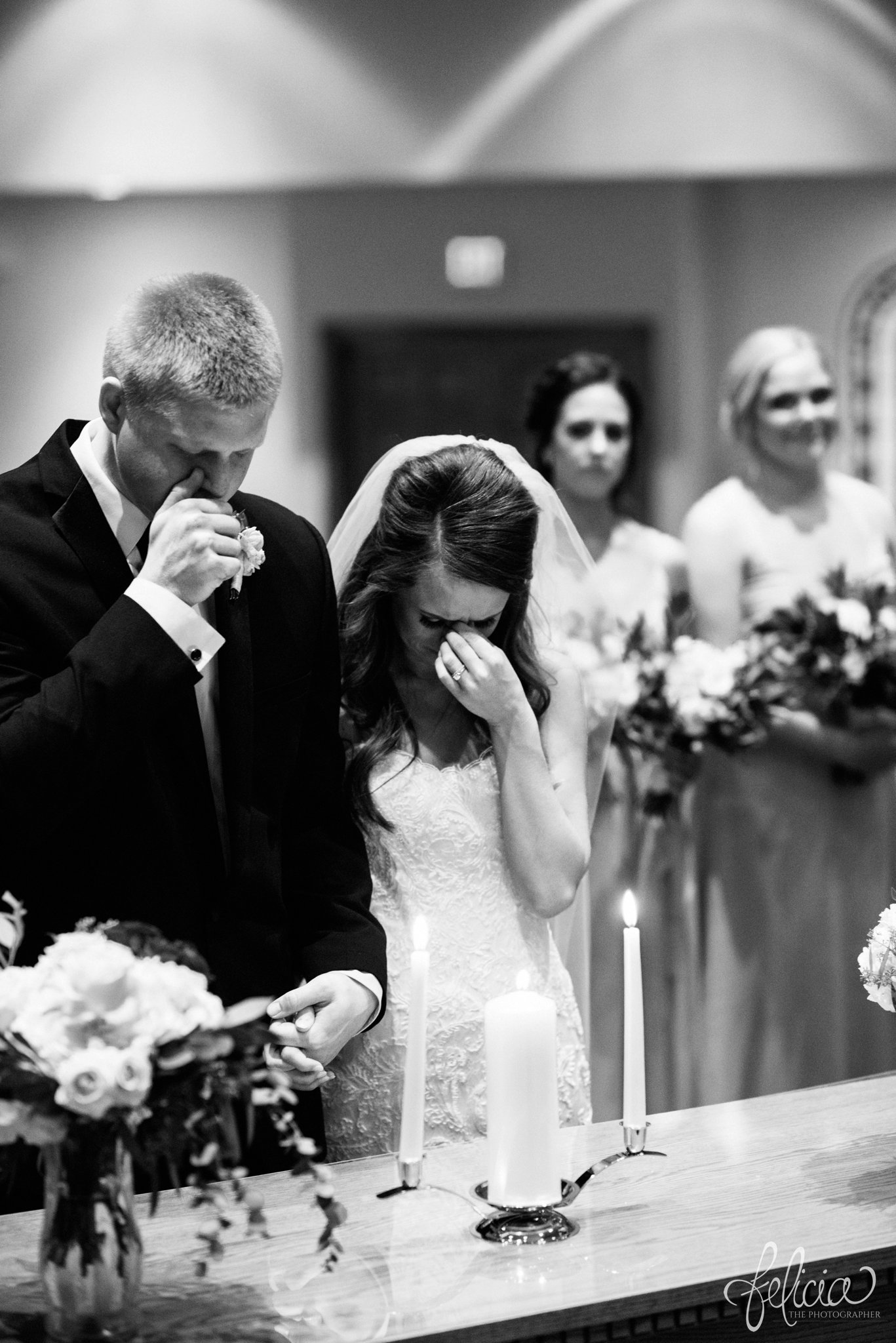 black and white | wedding | wedding photos | industrial | Rumely Event Space | wedding photography | images by feliciathephotographer.com | West Bottoms | wedding ceremony | The Providence Baptist Church | emotions | bride and groom at altar 