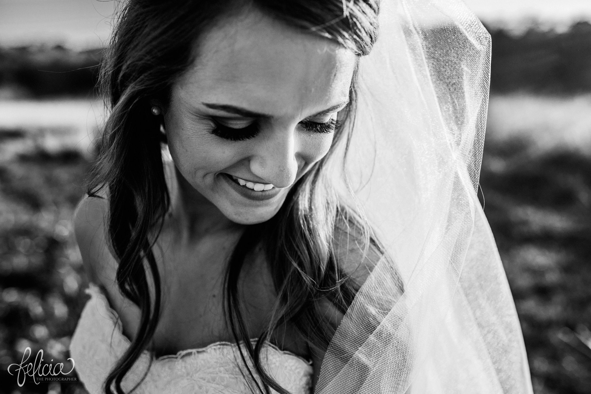 black and white | wedding | wedding photos | Rumely Event Space | wedding photography | images by feliciathephotographer.com | field background | nature | bride portrait | sunlight | smiling bride | bride solo shot | Paradise Makeup, Hair, and Airbrush Tanning | head shot 