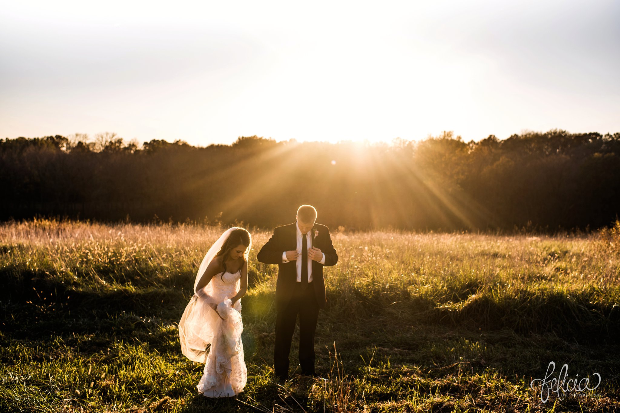 wedding | wedding photos | Rumely Event Space | wedding photography | images by feliciathephotographer.com | field background | nature | bride and groom portraits | sunlight | romantic sun | sun flare | candid | walking in field 