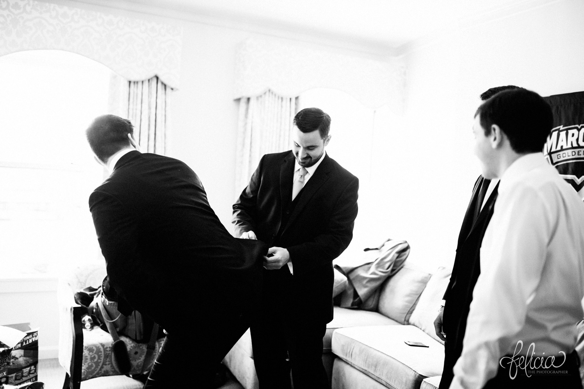 black and white |wedding | wedding photos | wedding photography | black and gold | Winter Wedding | Gatsby Wedding | The Elms | images by feliciathephotographer.com | Excelsior Springs | groom portrait | candid | funny groomsmen | candid 