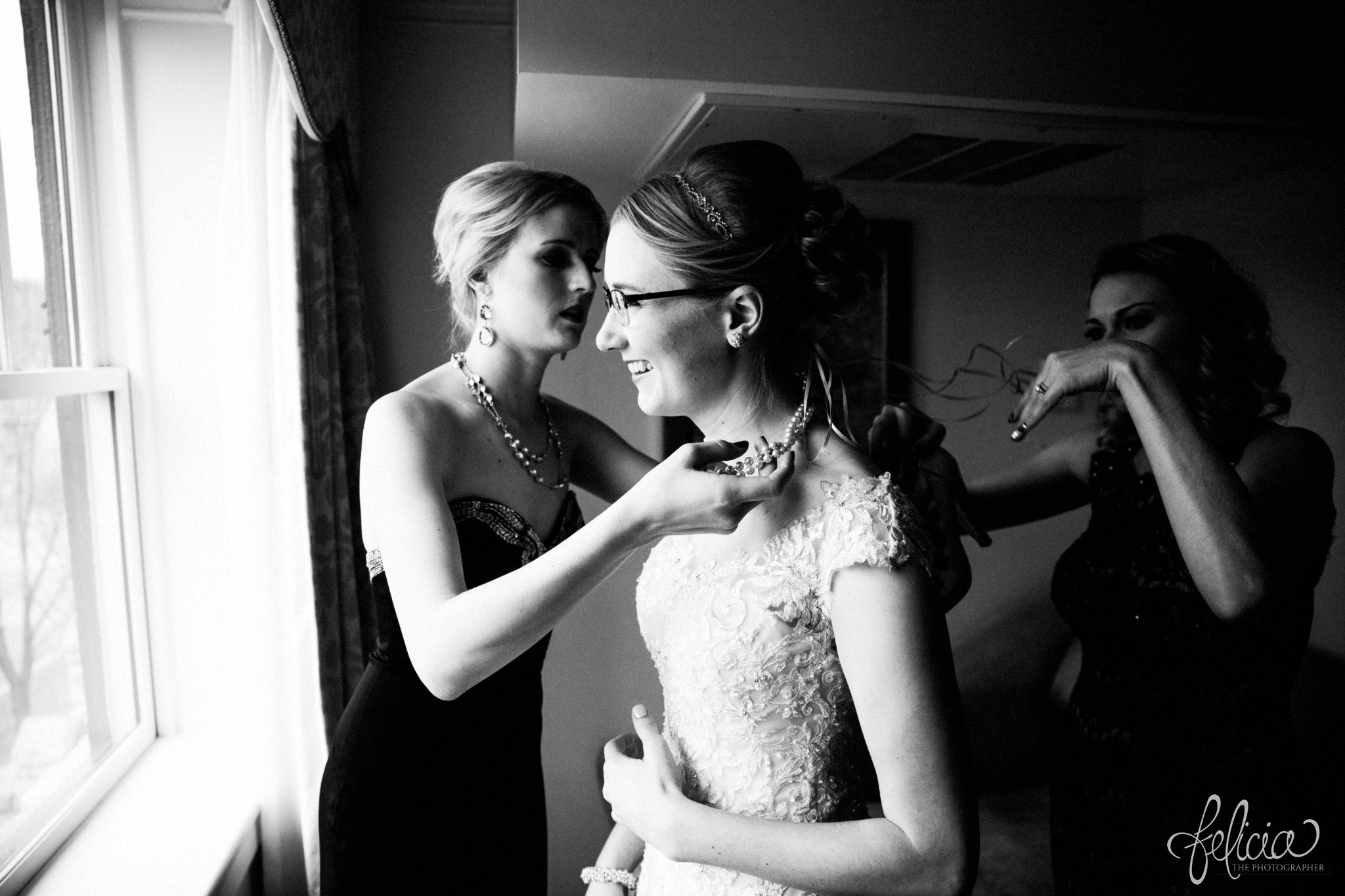 black and white | wedding | wedding photos | wedding photography | black and gold | Winter Wedding | Gatsby Wedding | The Elms | images by feliciathephotographer.com | Excelsior Springs | bride and sisters | wedding prep | getting ready pictures | candid | Maggie Sottero | lace wedding dress | backless wedding dress | pearl accessories | pearl necklace | laughing bride 