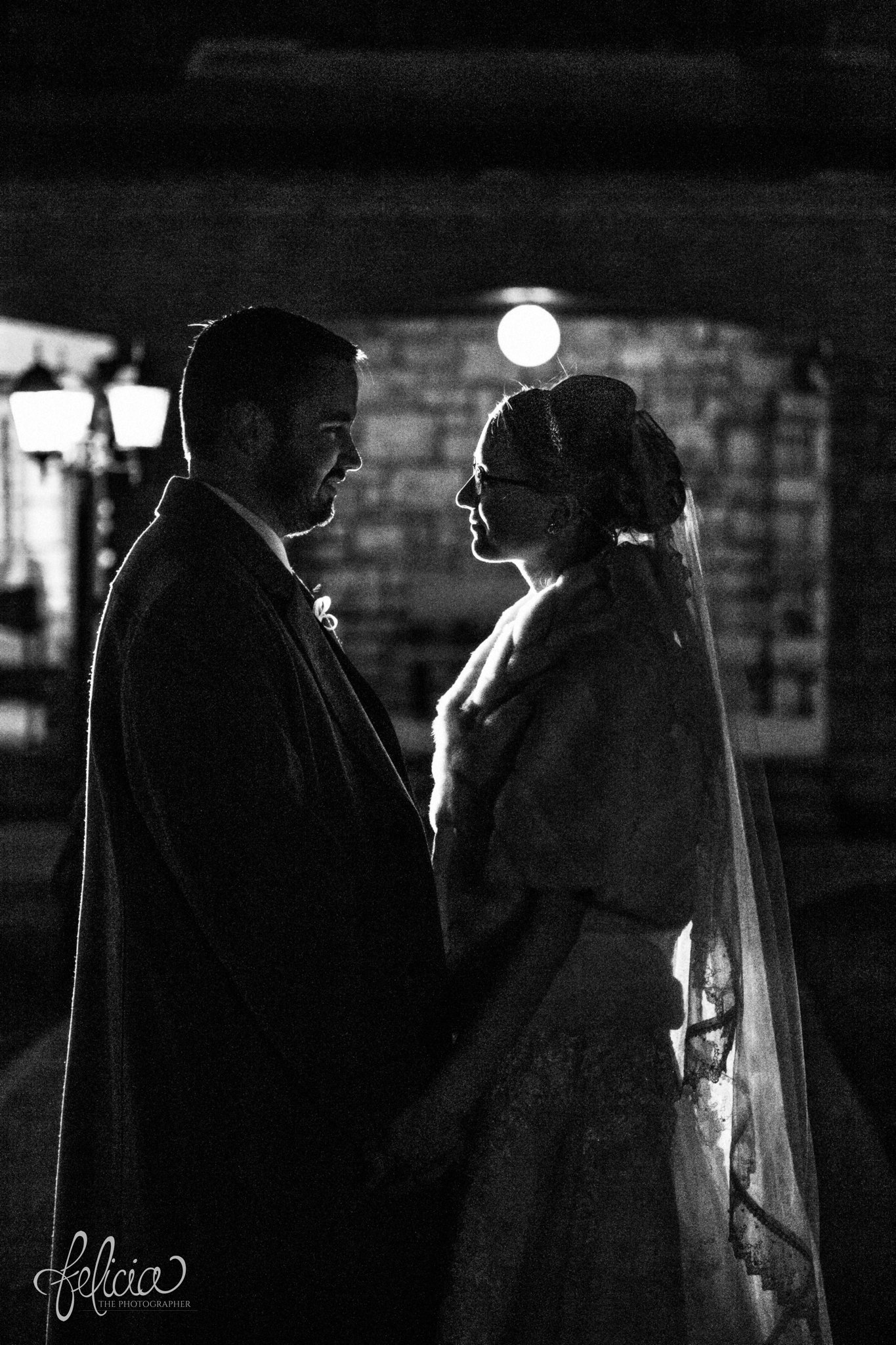 black and white | wedding | wedding photos | wedding photography | black and gold | Winter Wedding | Gatsby Wedding | The Elms | images by feliciathephotographer.com | Excelsior Springs | historic venue | night portraits | bride and groom portraits | night wedding | romantic outdoor pose | bride wedding coat 