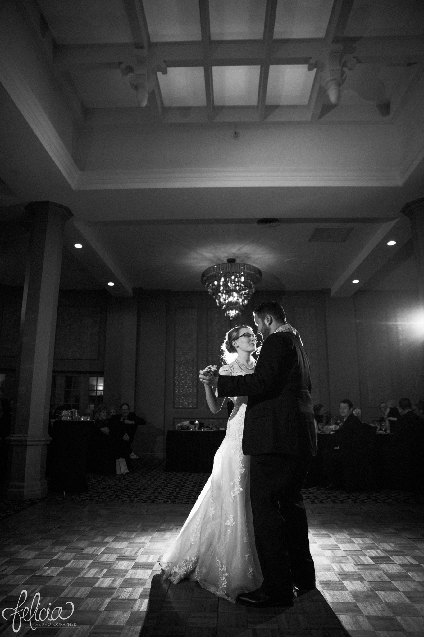 black and white | wedding | wedding photos | wedding photography | black and gold | Winter Wedding | Gatsby Wedding | The Elms | images by feliciathephotographer.com | Excelsior Springs | historic venue | first dance | romantic background | romance | chandeliers | Maggie Sottero | dramatic venue | romantic pose | high ceilings 