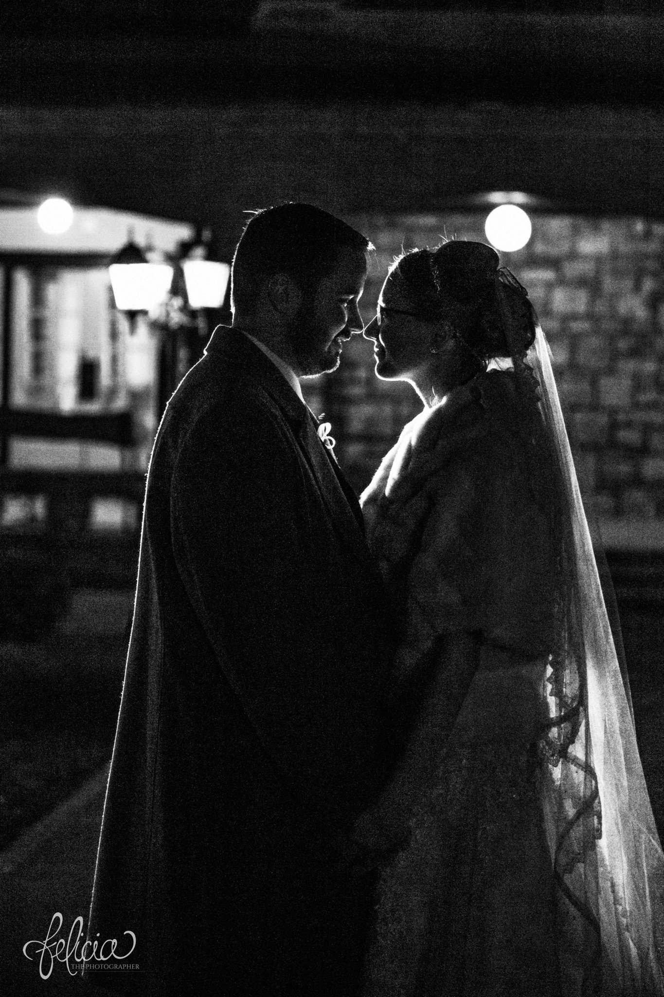 black and white | wedding | wedding photos | wedding photography | black and gold | Winter Wedding | Gatsby Wedding | The Elms | images by feliciathephotographer.com | Excelsior Springs | historic venue | night portraits | bride and groom portraits | night wedding | romantic outdoor pose | bride wedding coat 