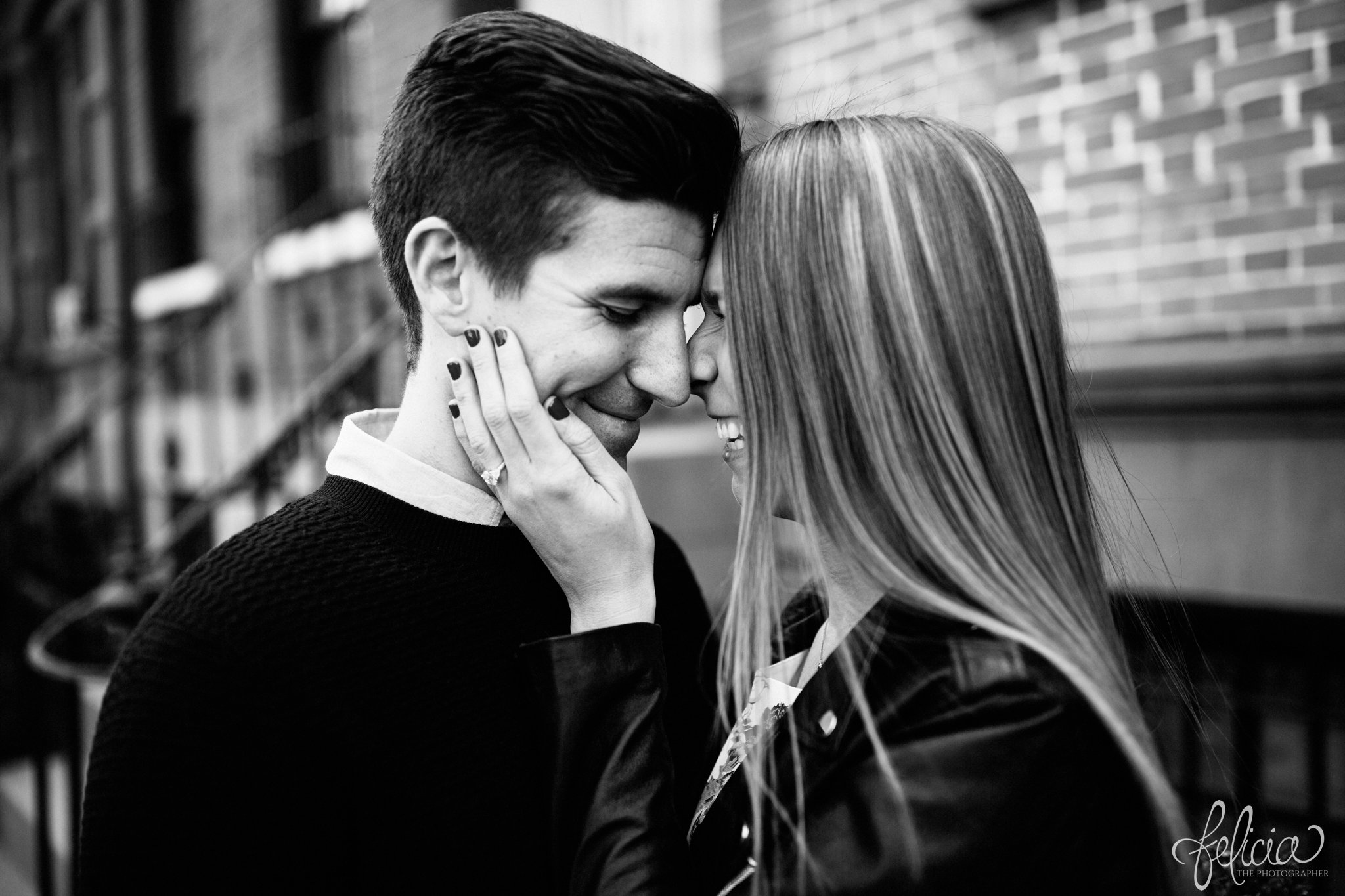 wedding | New York City | West Village | New York City photography | wedding photography | images by feliciathephotographer.com | engagement photos | engagement pictures in New York City | candid | romantic engagement pictures | black and white | brick background | engagement ring | laughing bride 