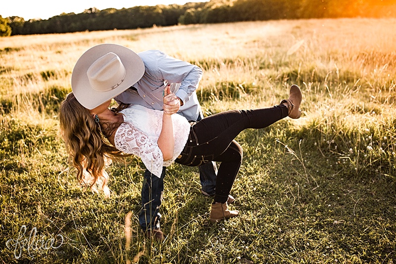 images by feliciathephotographer.com | engagement photographer | kansas farm | country | golden hour | sunset | romantic | true love | southern belle | bride to be | field | cowboy hat | dancing | playful | dip | hidden kiss 