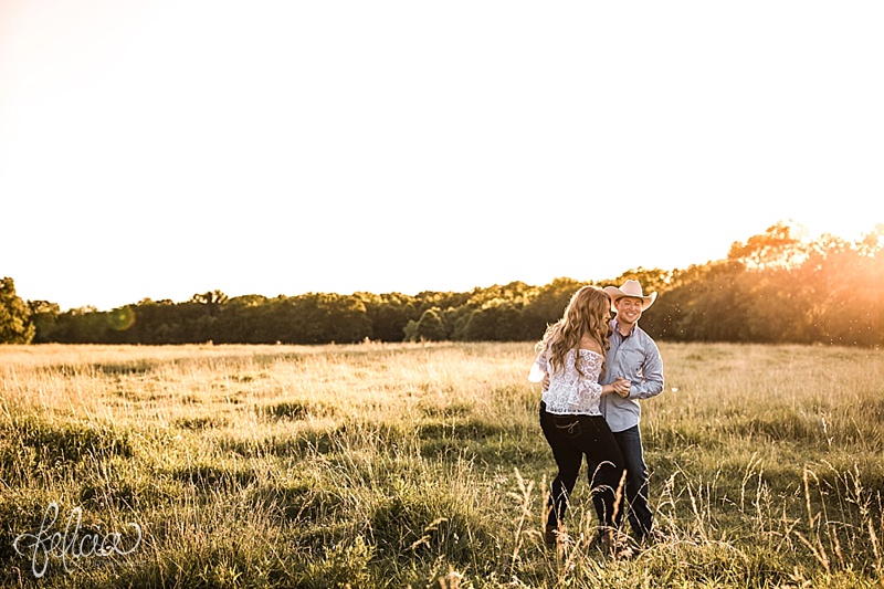 images by feliciathephotographer.com | engagement photographer | kansas farm | country | golden hour | sunset | romantic | true love | southern belle | bride to be | field | cowboy hat | dancing | playful |