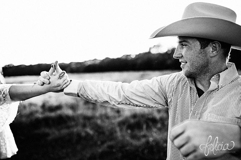 images by feliciathephotographer.com | engagement photographer | kansas farm | country | golden hour | sunset | romantic | true love | southern belle | bride to be | field | cowboy hat | holding hands | black and white | dancing | playful
