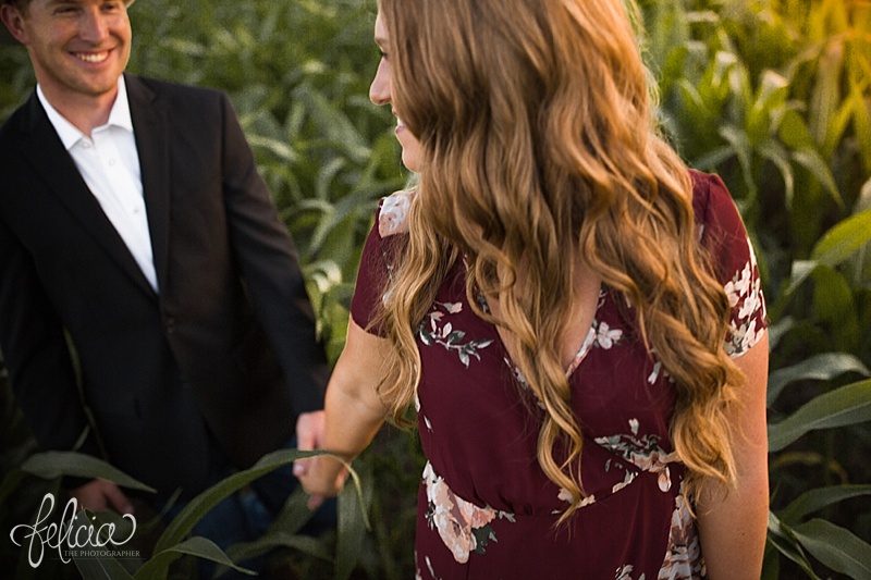 images by feliciathephotographer.com | engagement photographer | kansas farm | country | golden hour | sunset | romantic | true love | southern belle | bride to be | corn field | cowboy hat | floral dress